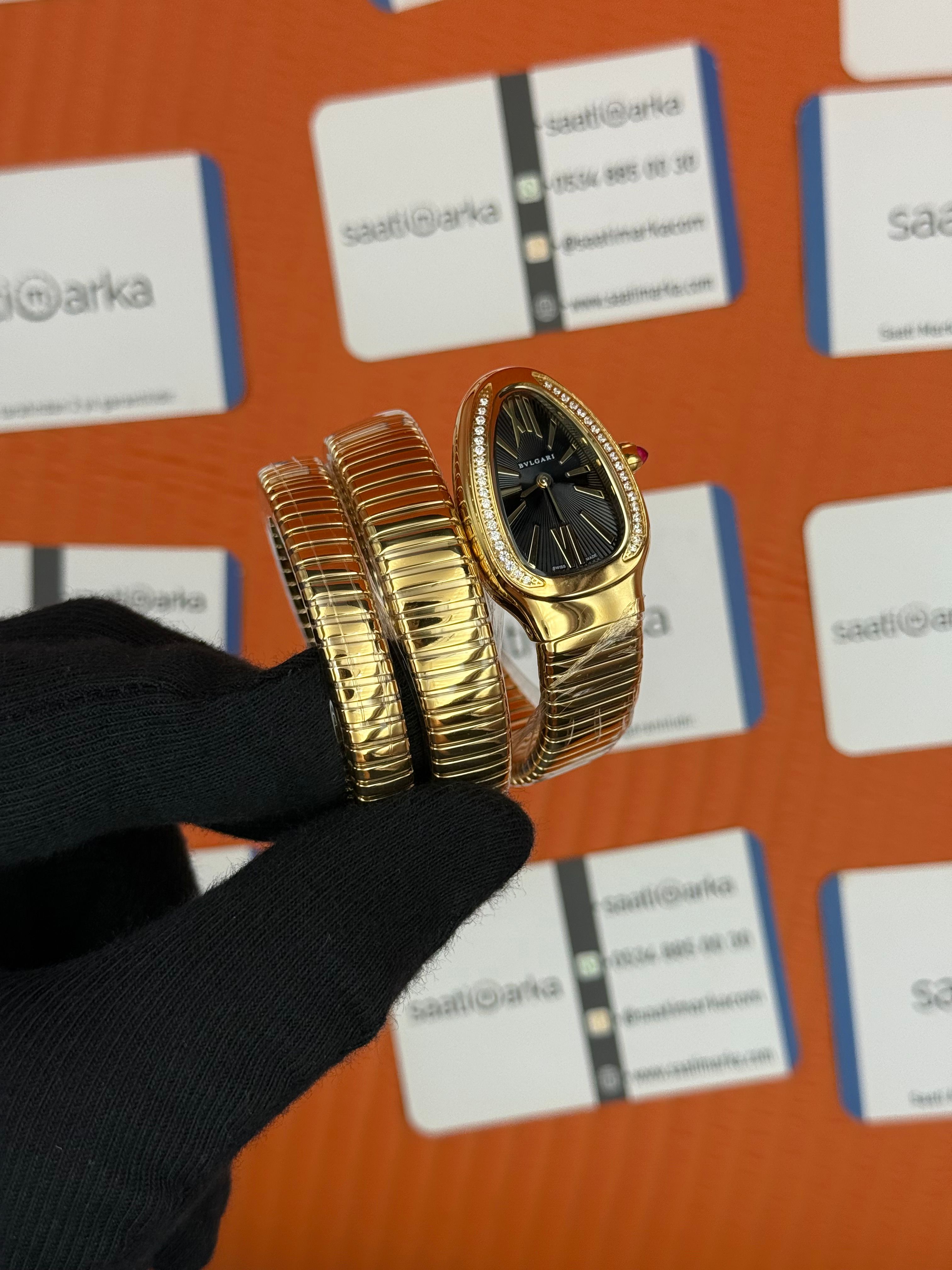 BVLGARİ serpenti çift sarma gold kordon taşlı bezel siyah kadran kadın kol saati