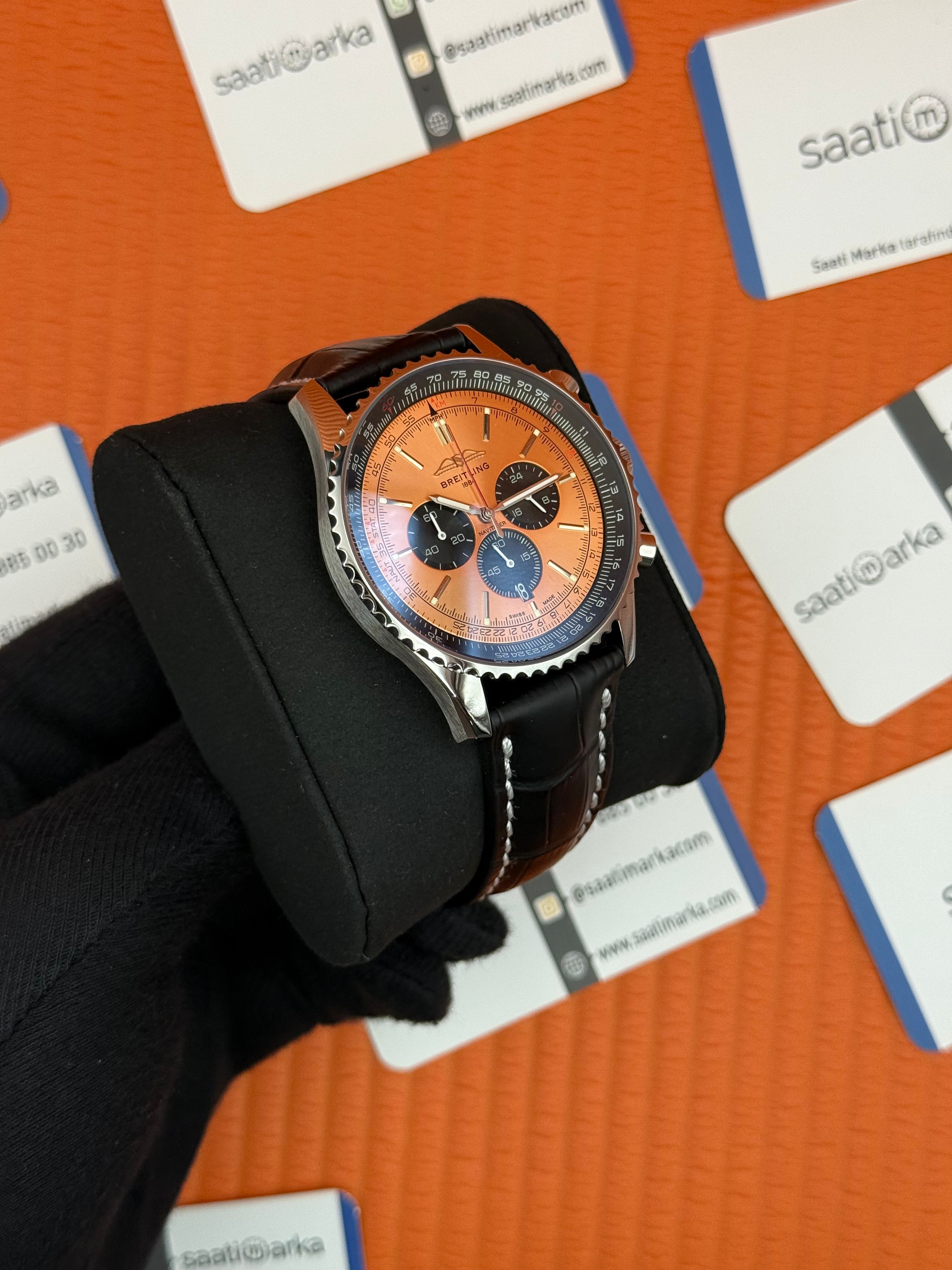 BREITLING Navitimer siyah deri kordon turuncu kadran çelik kasa 