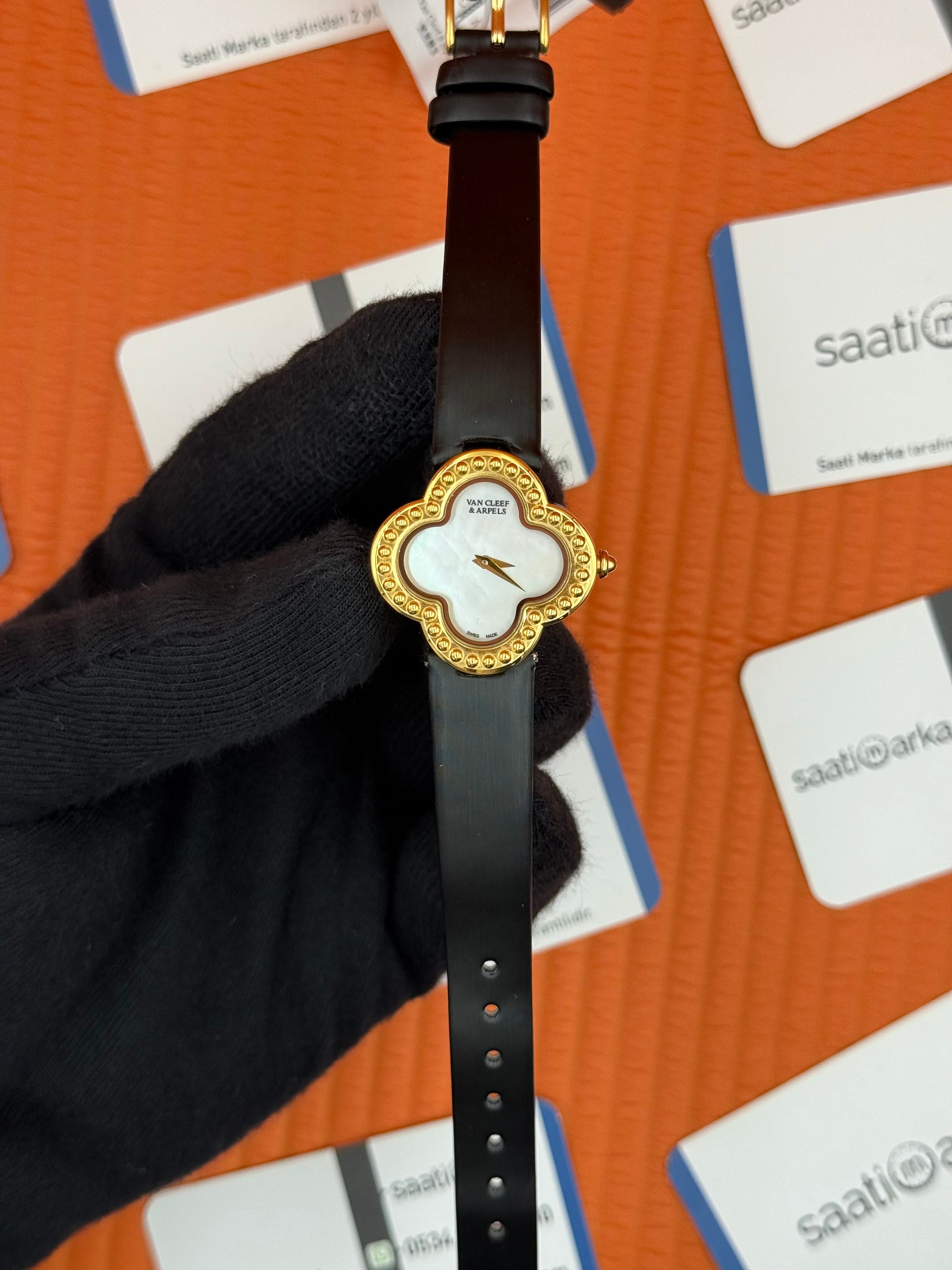 VAN CLEEF beyaz kadran gold kasa bezel kadın kol saati