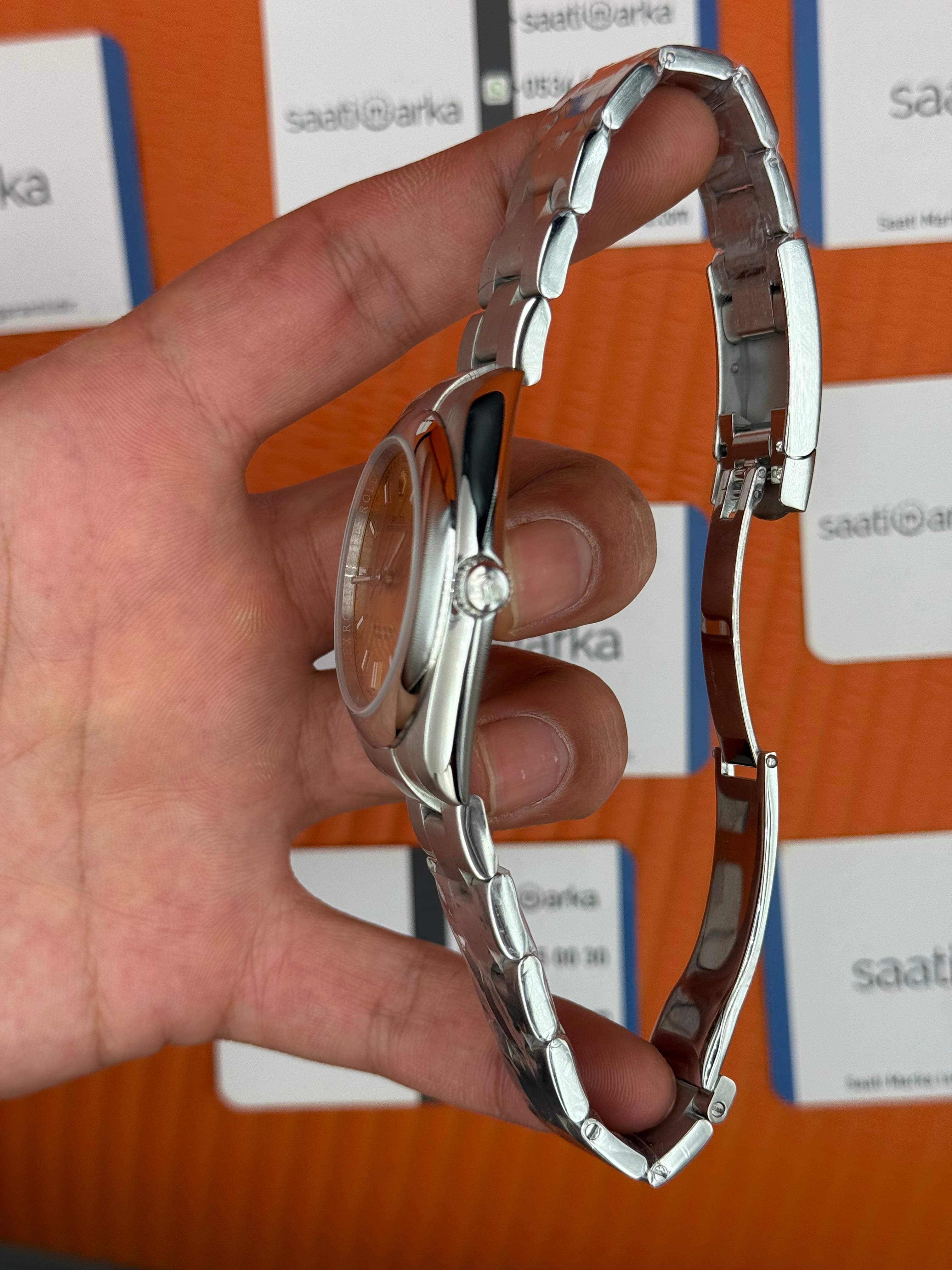 ROLEX oyster perpetual şampanya kadran silver kasa kordon erkek kol saati