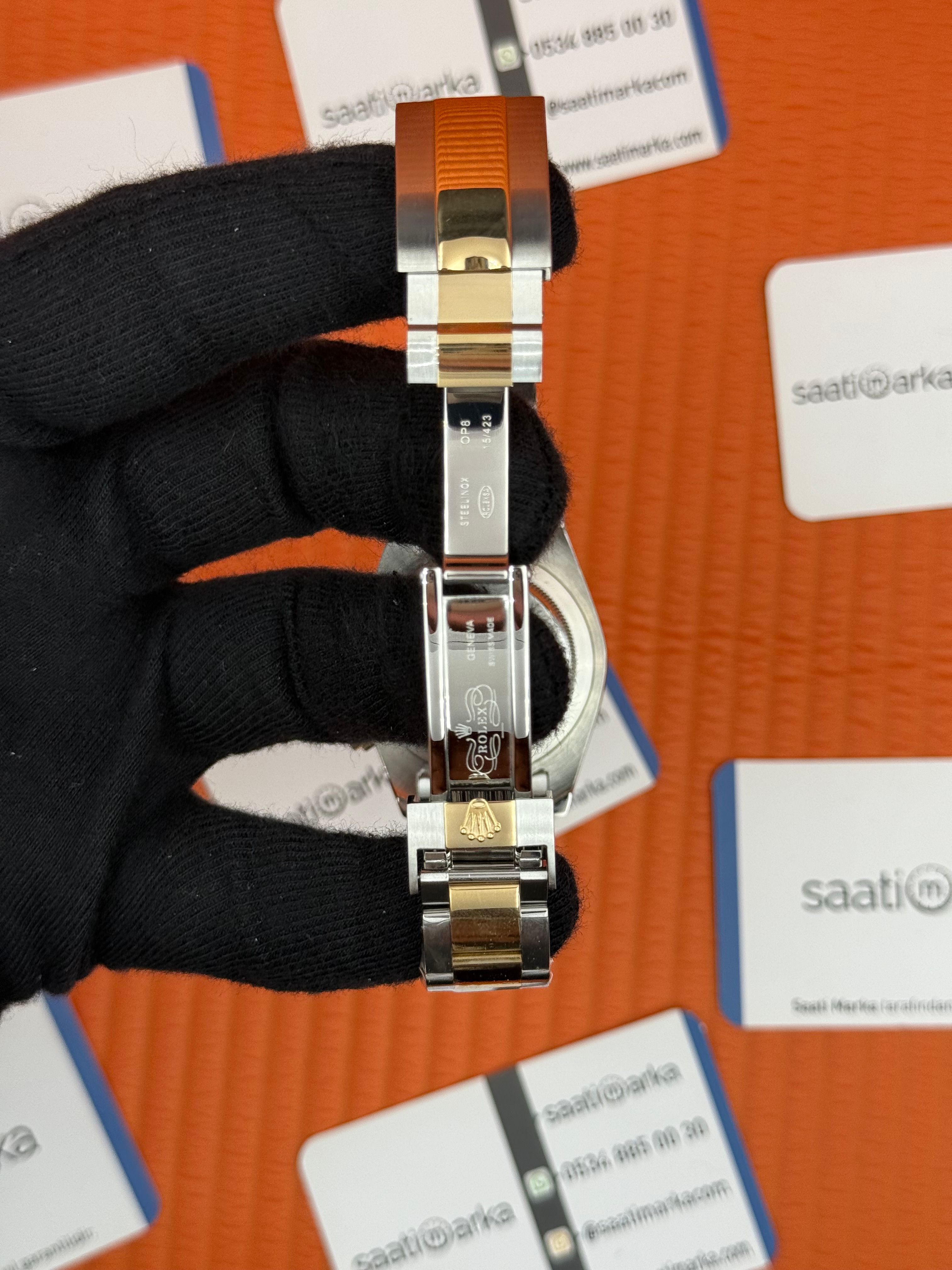 ROLEX Daytona black dial gold silver kasa-kordon