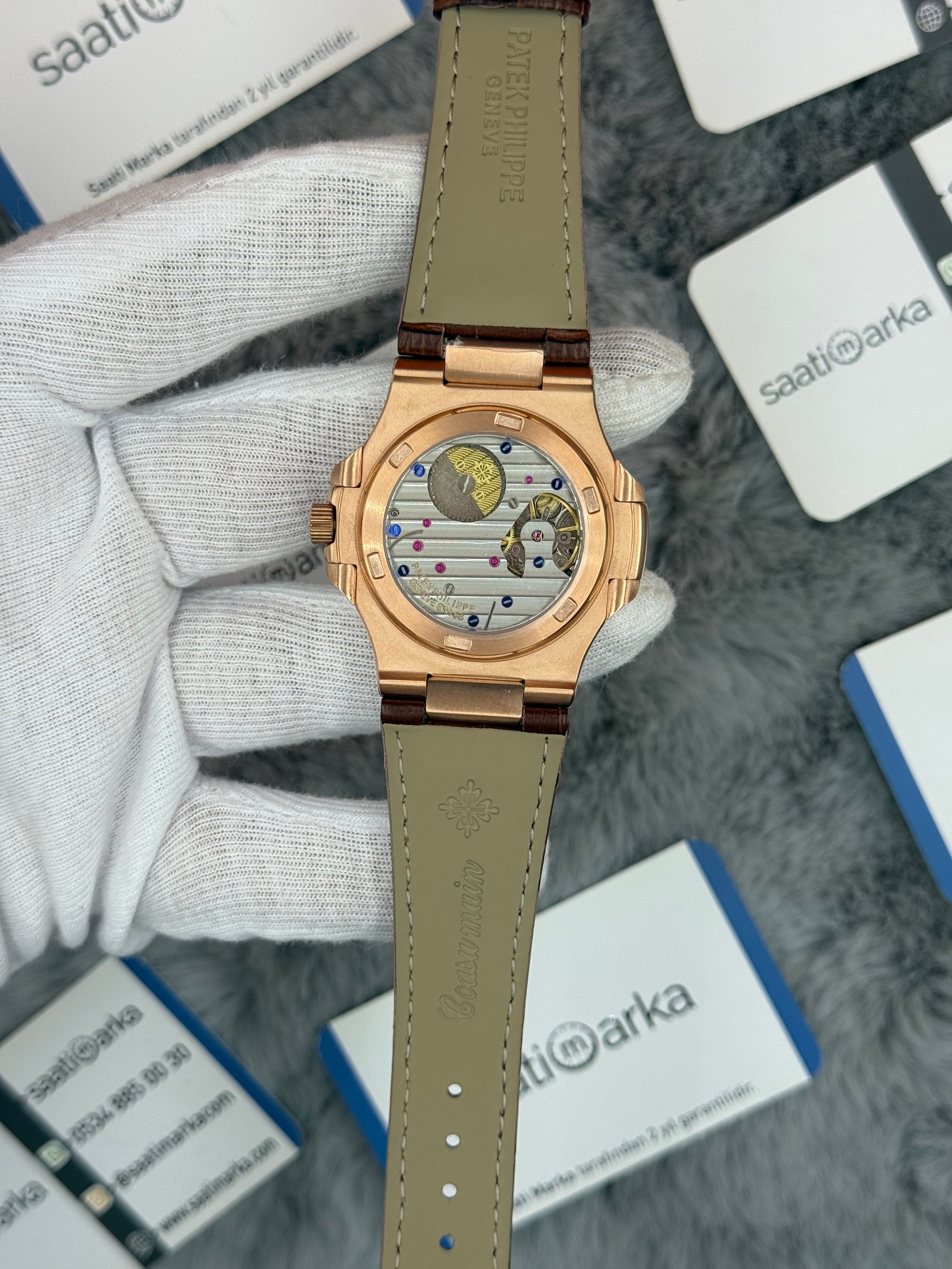 PATEK PHİLİPPE nautilus moontphase 5712 taşlı bezel kahverengi kadran kahverengi deri korodon 40mm erkek kol saati