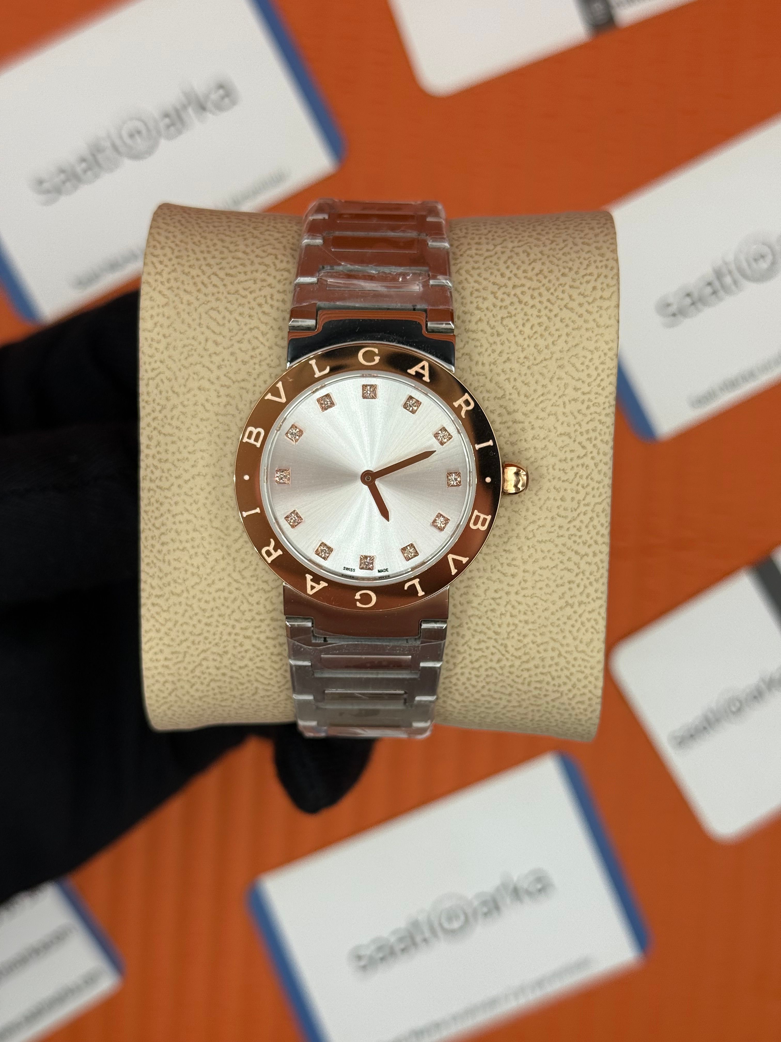 BVLGARI beyaz kadran rose yazılı bezel silver kasa kordon kadın kol saati
