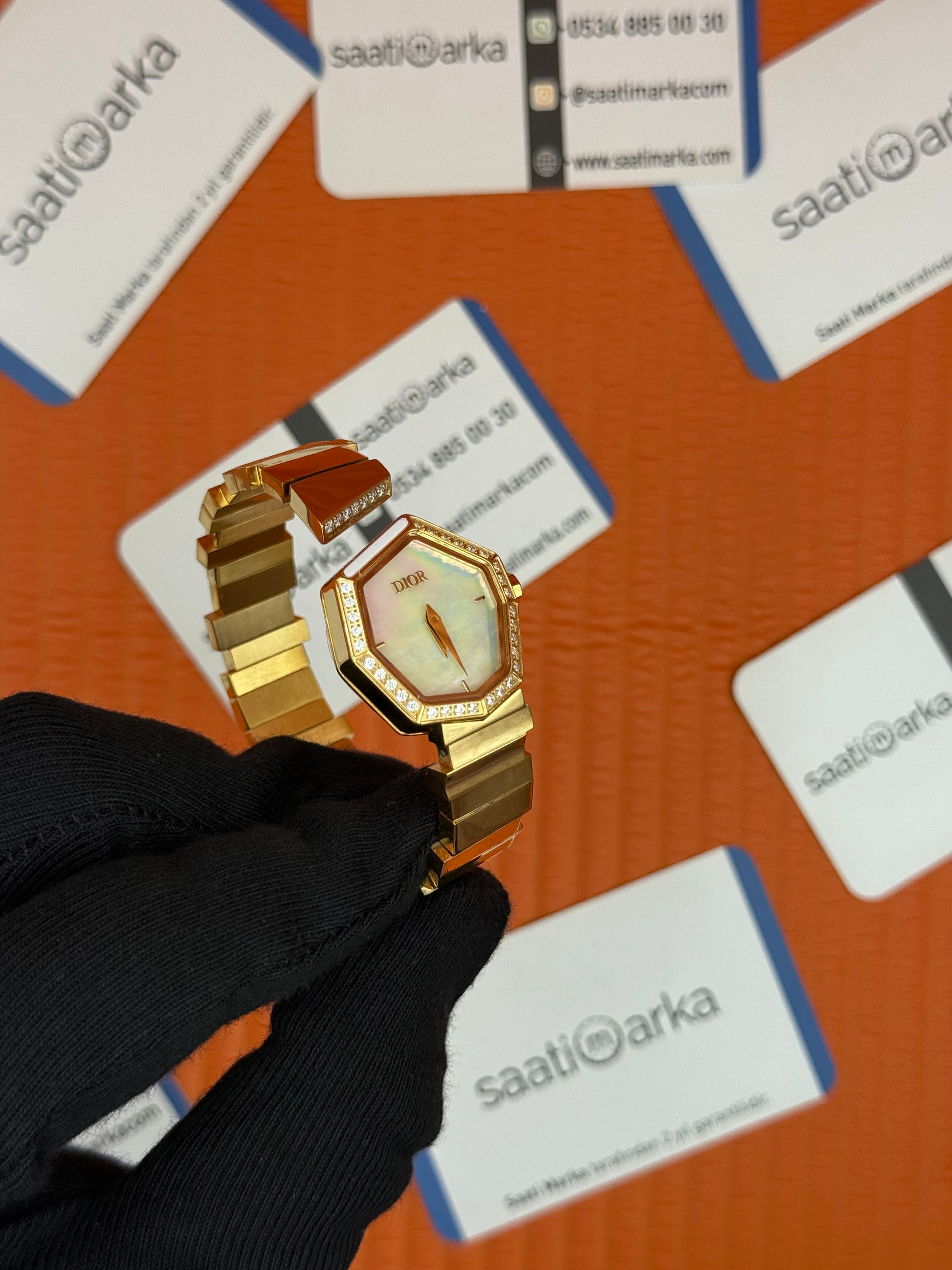 DİOR sedefli kadran taşlı bezel gold kasa kordon kadın kol saati