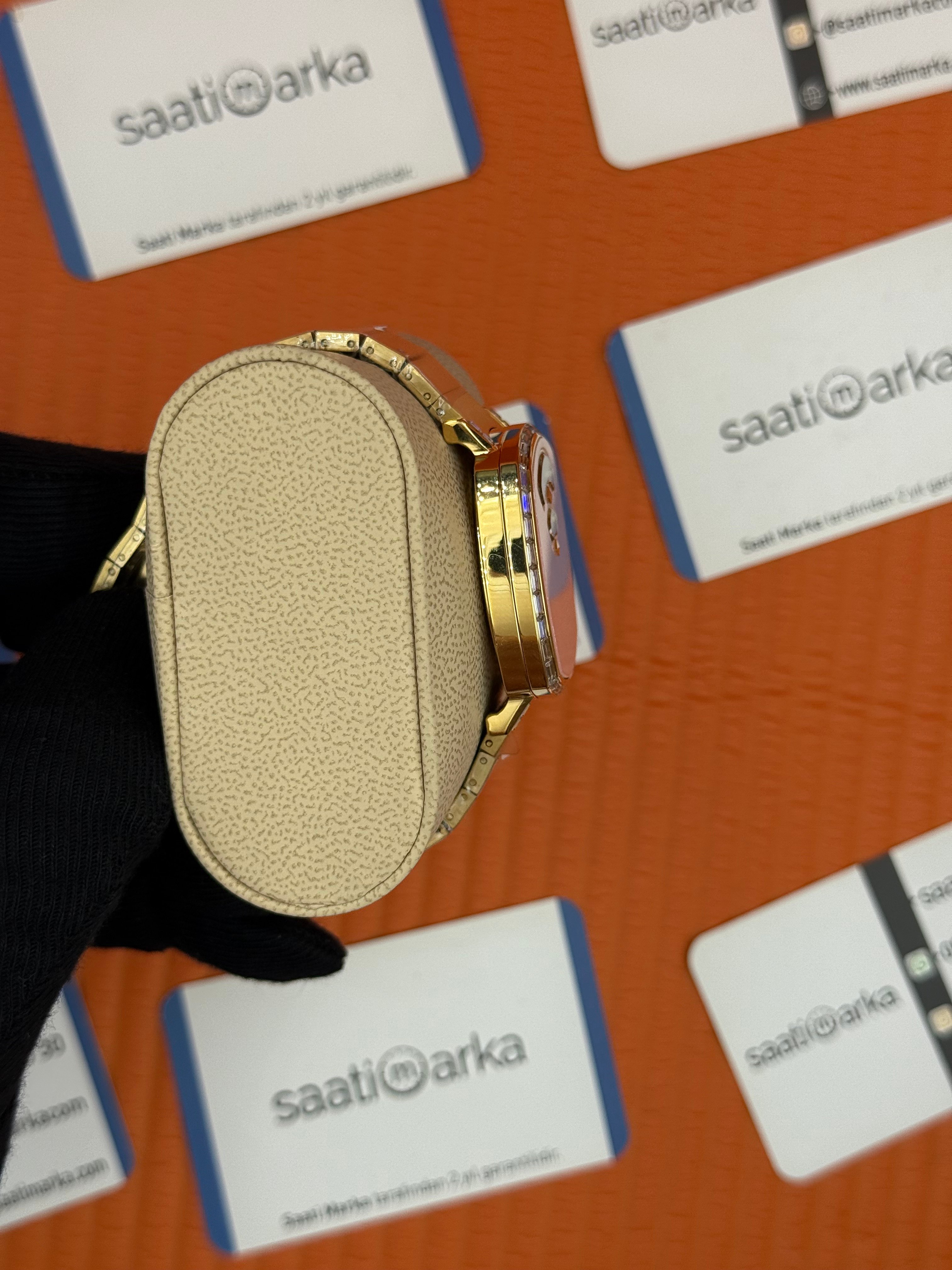 GUCCI GRIP toz pembe kadran gold kordon kadın kol saati