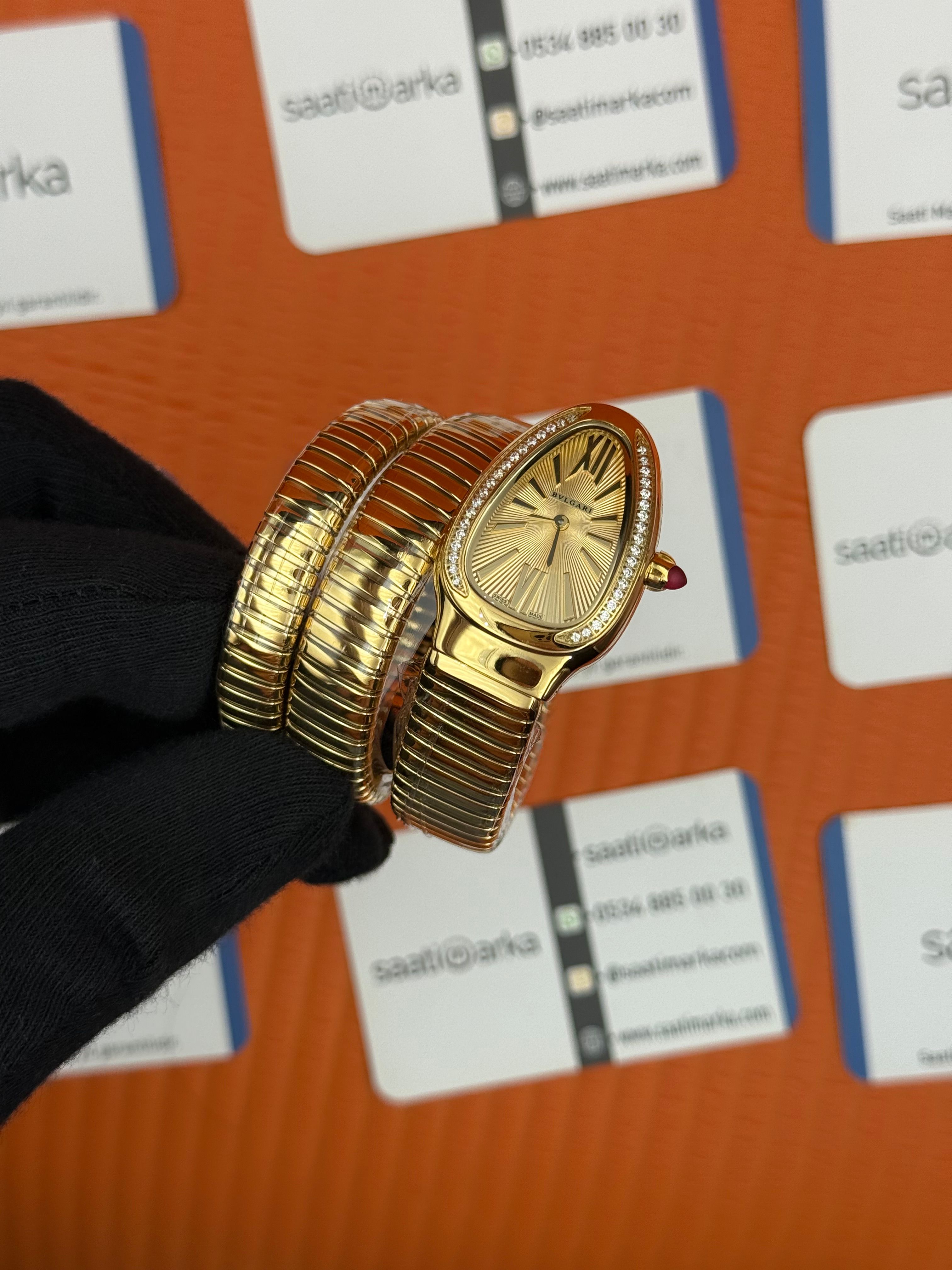BVLGARİ serpenti çift sarma gold kordon taşlı bezel şampanya kadran kadın kol saati