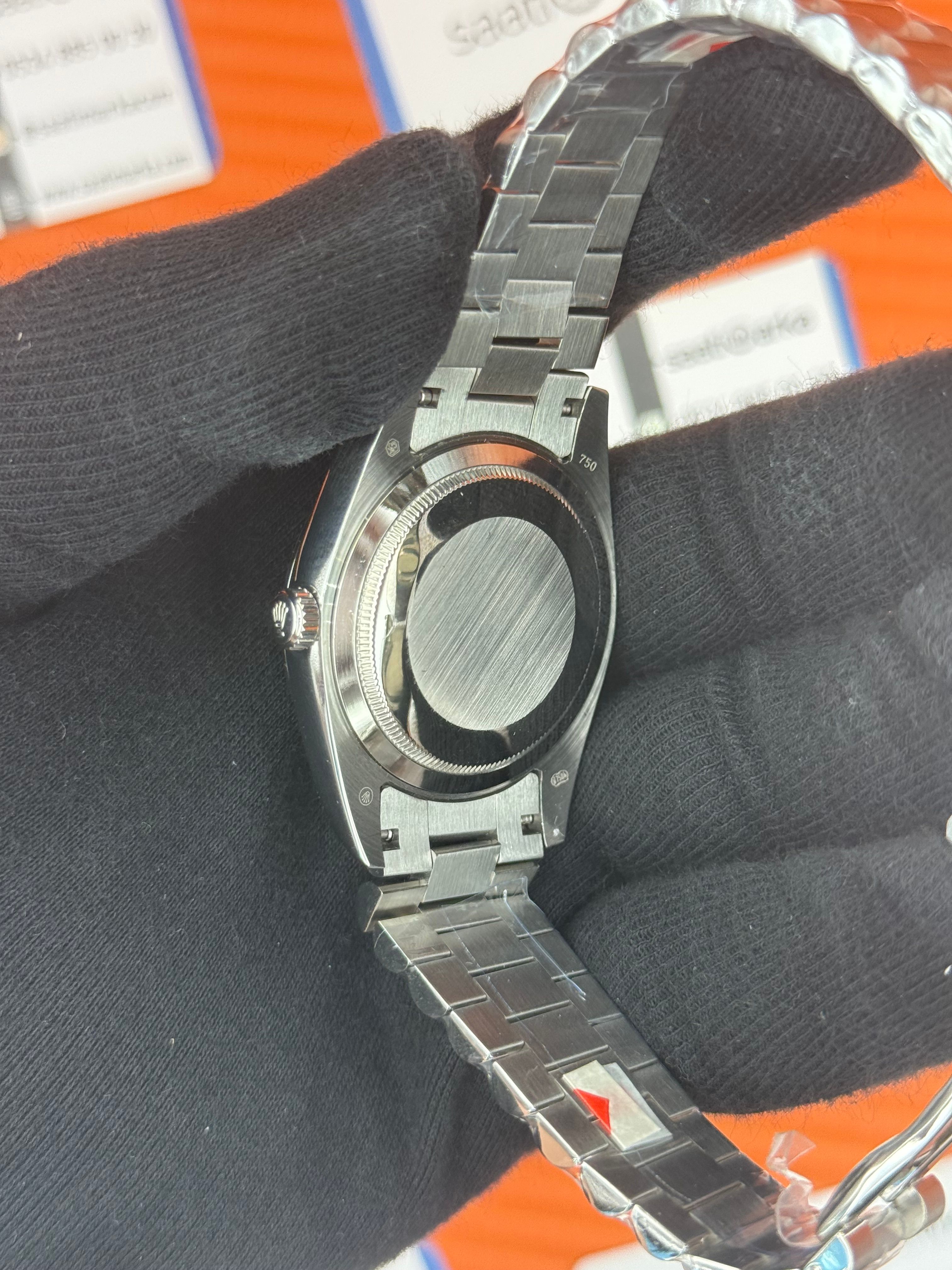 ROLEX Day Date baget taşlı beyaz kadran silver president kordon