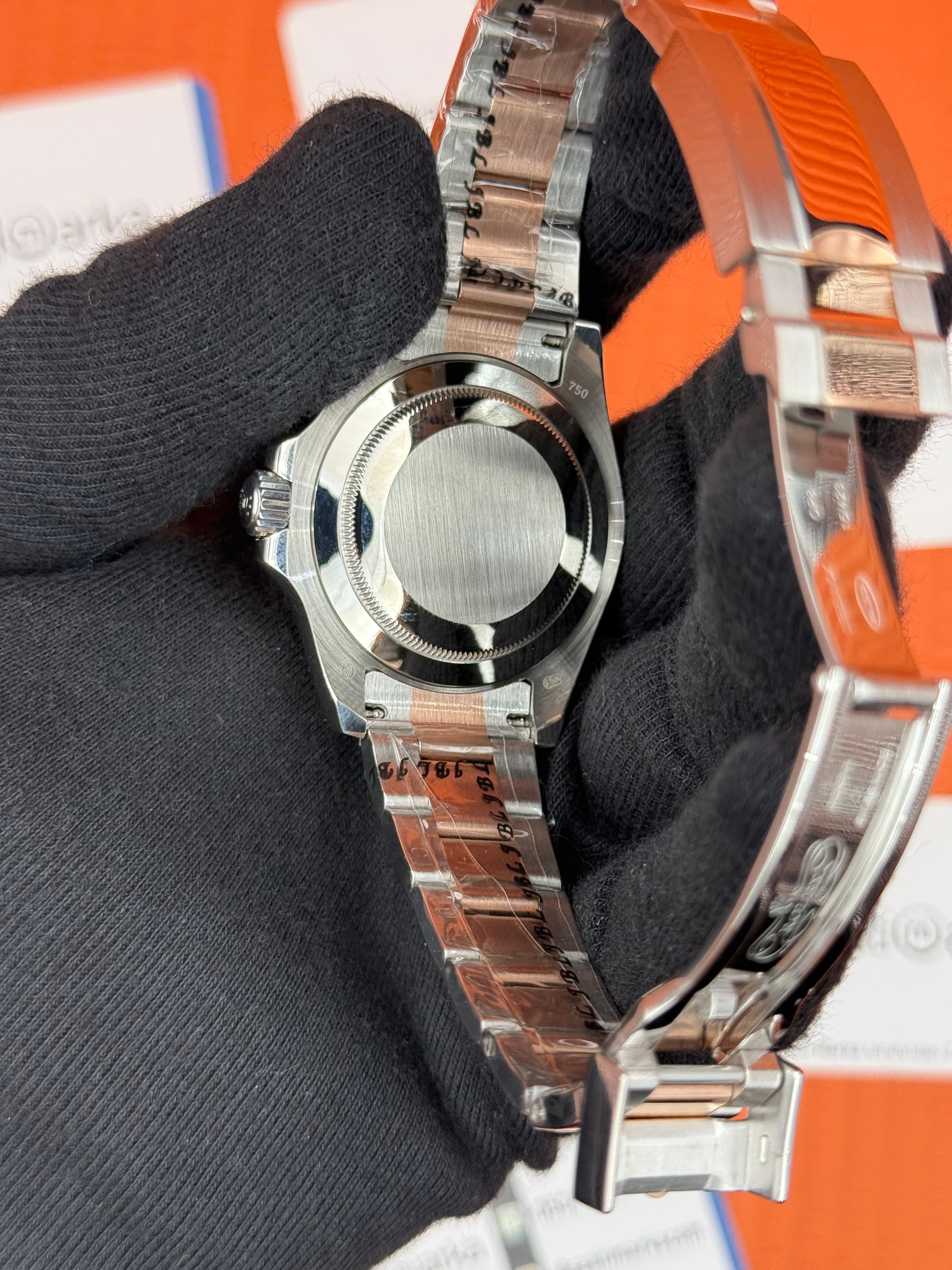 ROLEX Yacht Master oyster black dial rose silver kordon