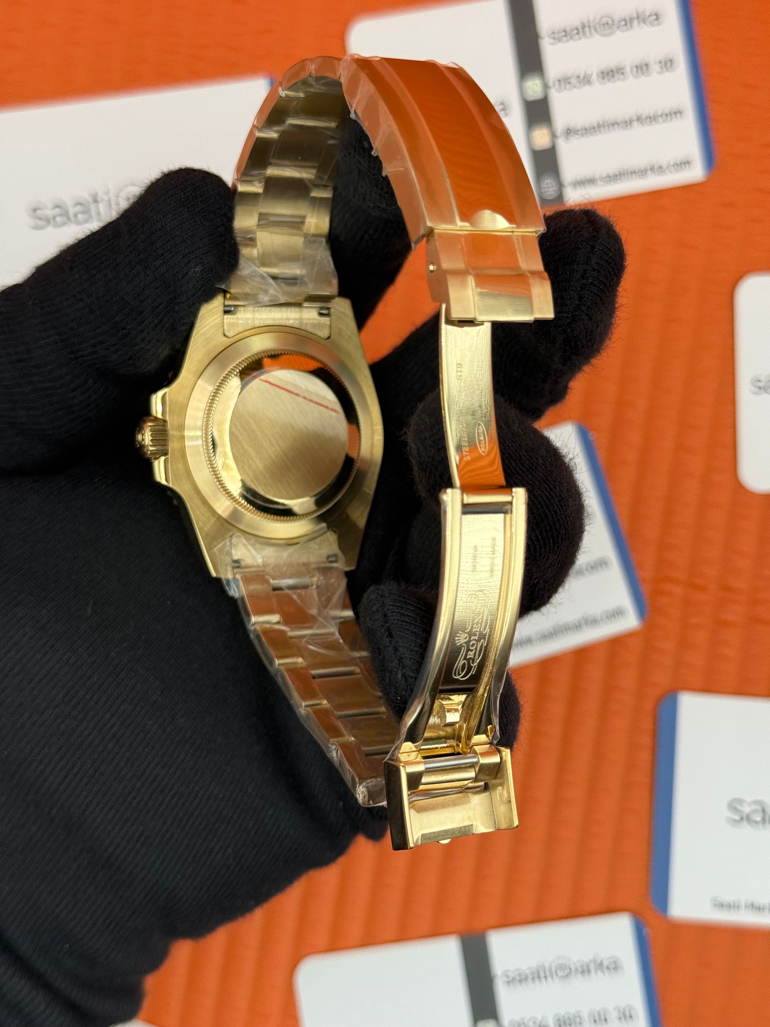 ROLEX Submariner oyster blacil dial gold kasa-kordon