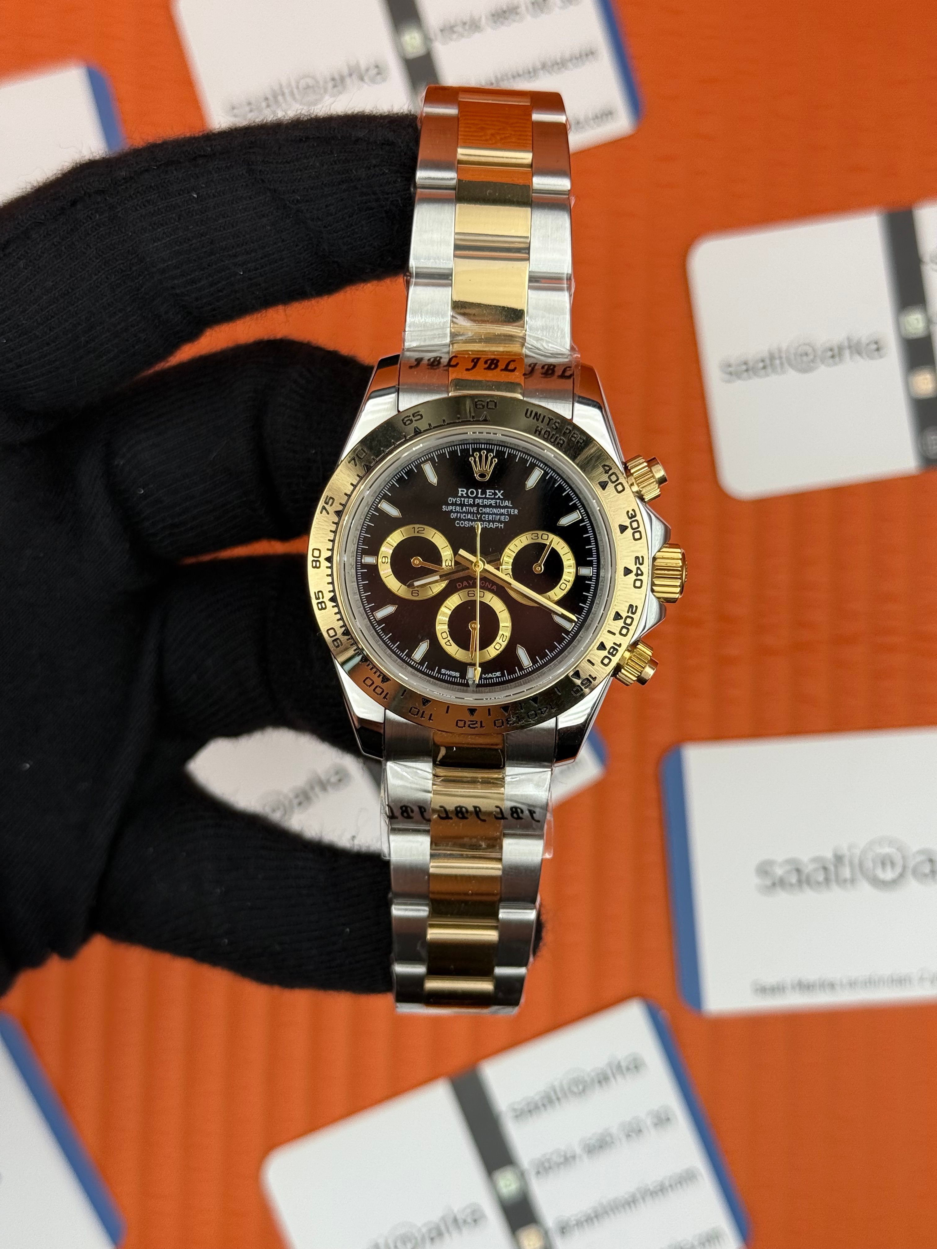 ROLEX Daytona black dial gold silver kasa-kordon