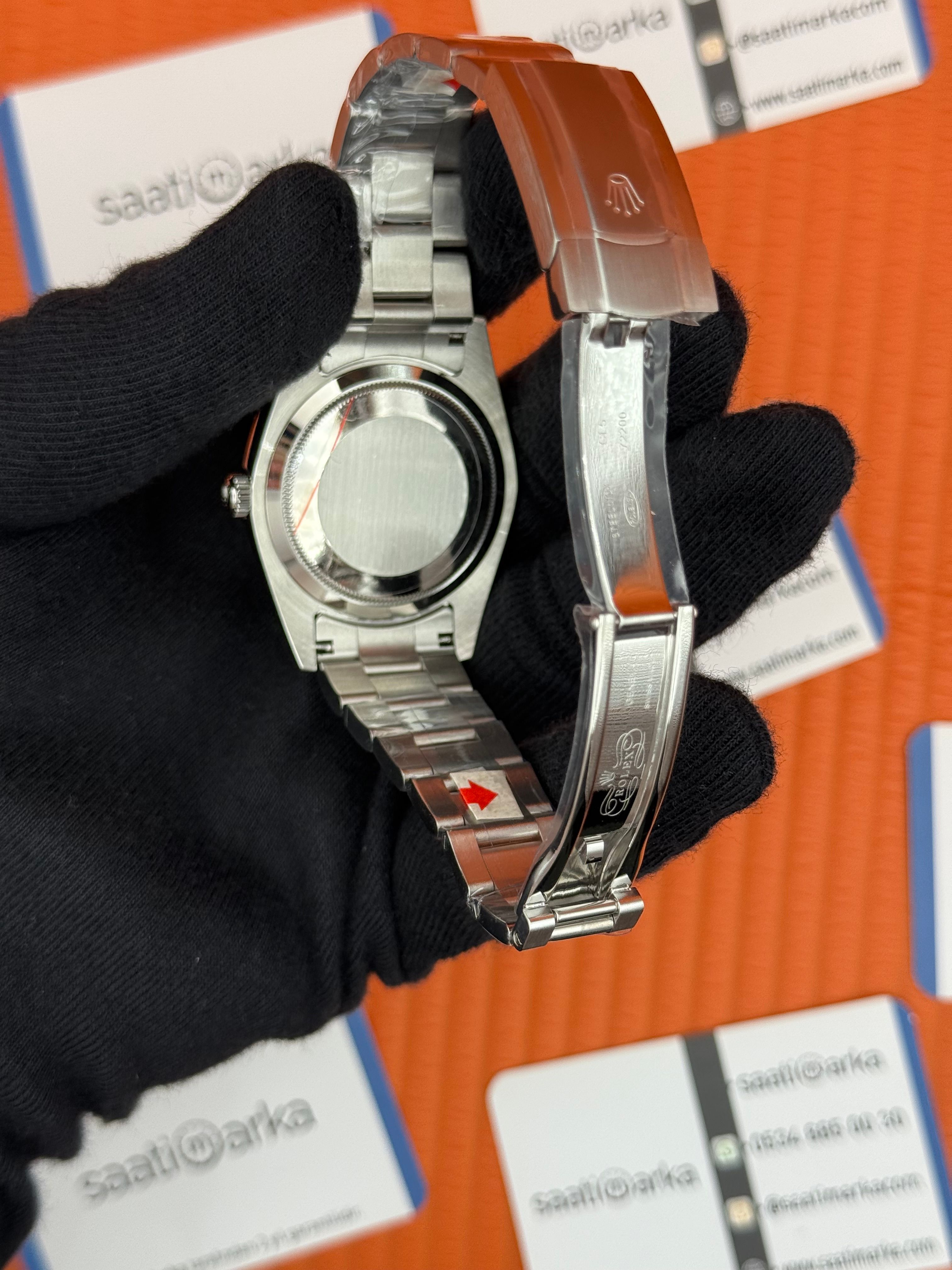 ROLEX OYSTER Perpetual pink dial silver kasa-kordon