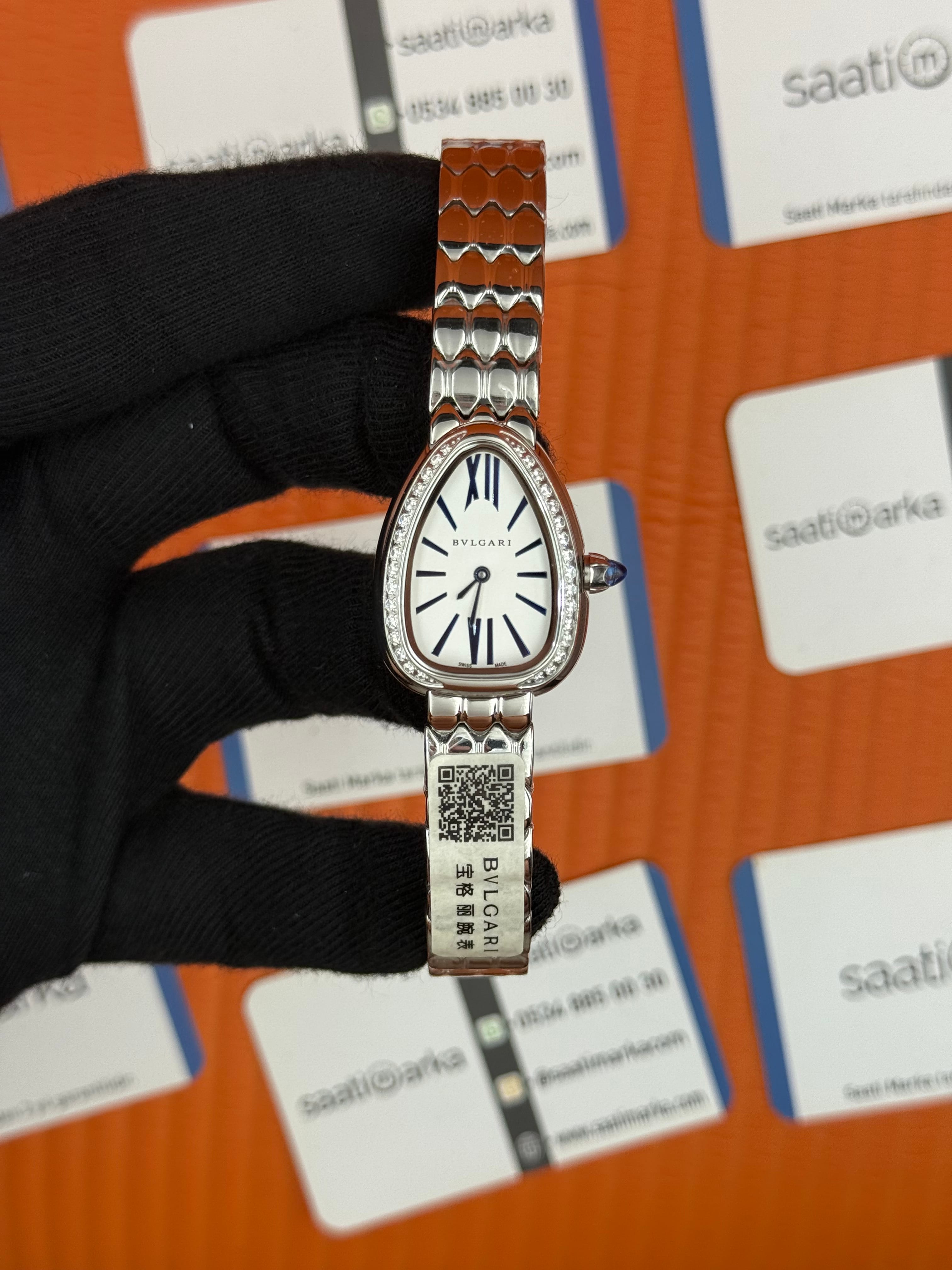 BVLGARİ serpenti seduttori taşlı bezel beyaz kadran silver kasa kordon  kadın kol saati