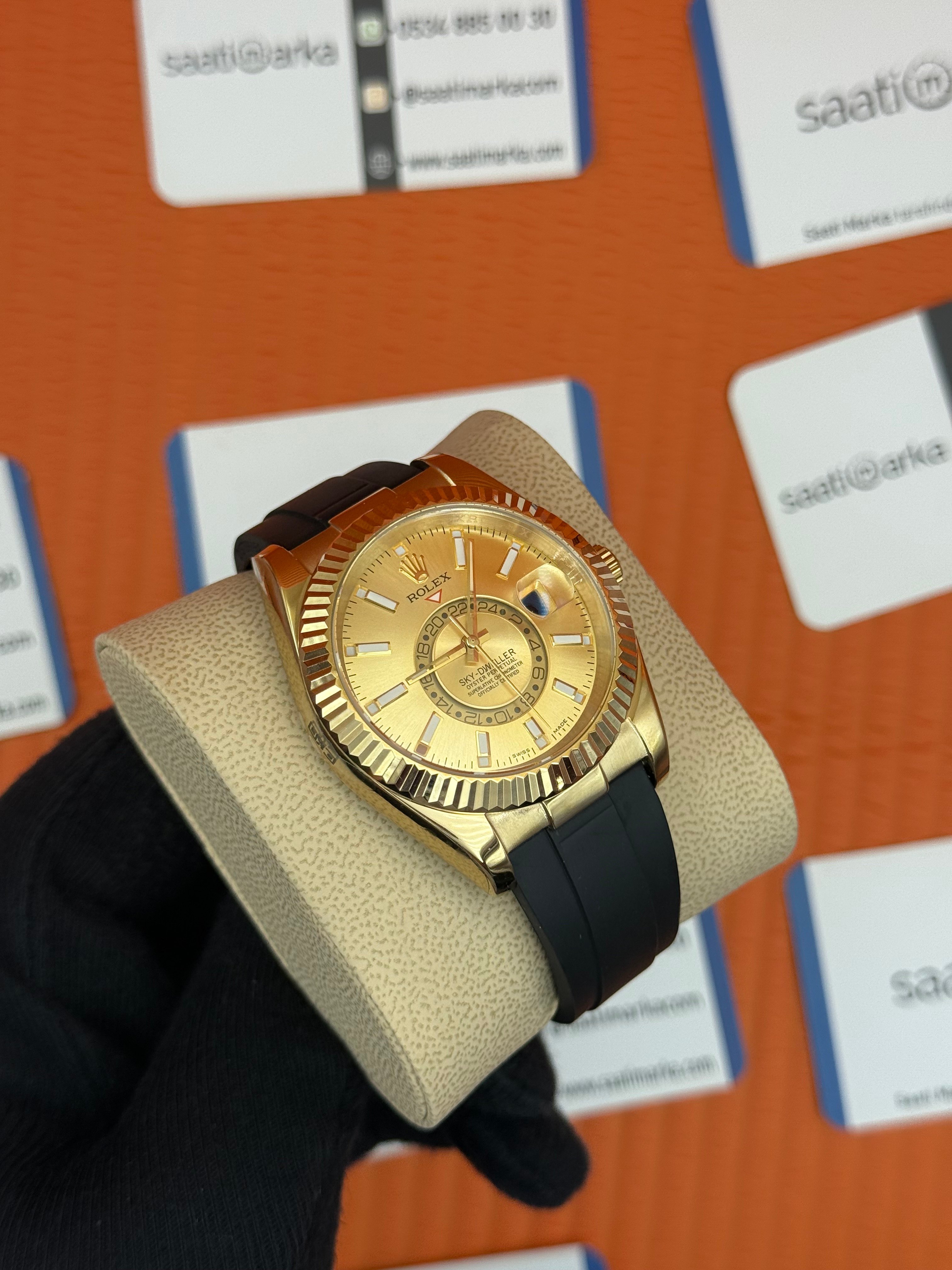 ROLEX Sky Dweller champagne dial gold kasa siyah kauçuk kordon