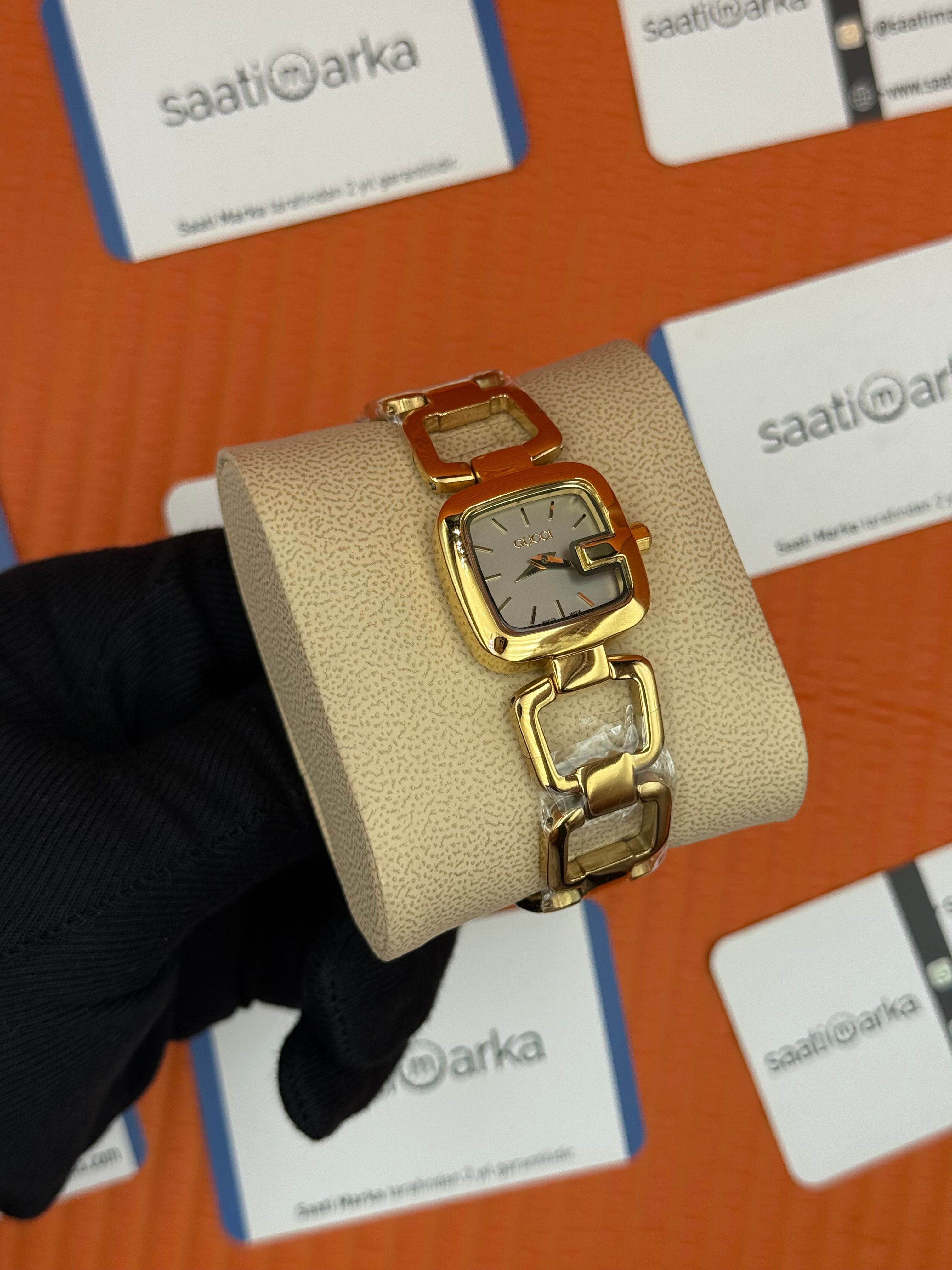 GUCCI YA gri kadran gold kasa kordon kadın kol saati