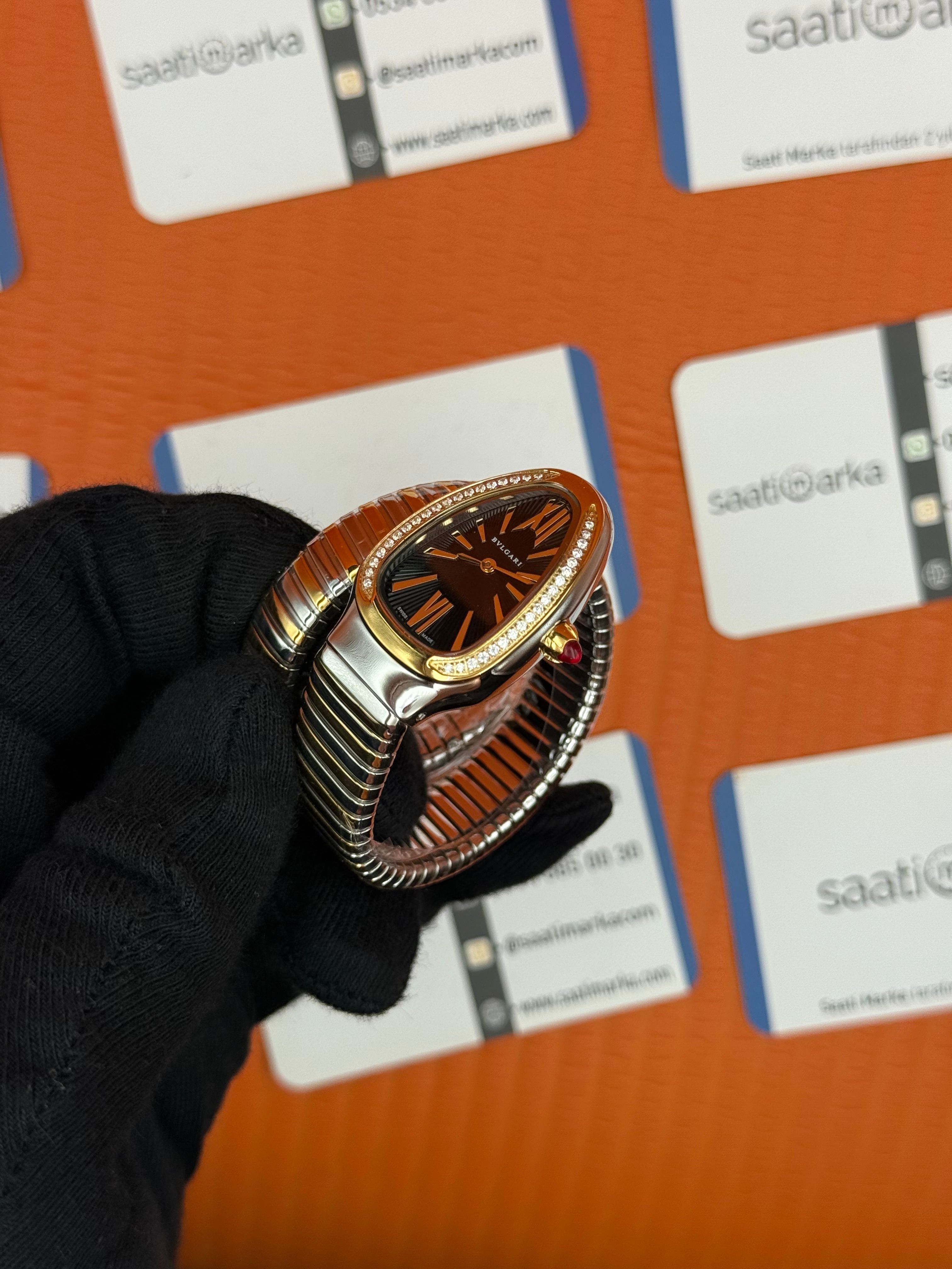 BVLGARİ serpenti tek sarma gold silver kordon taşlı bezel siyah kadran kadın kol saati