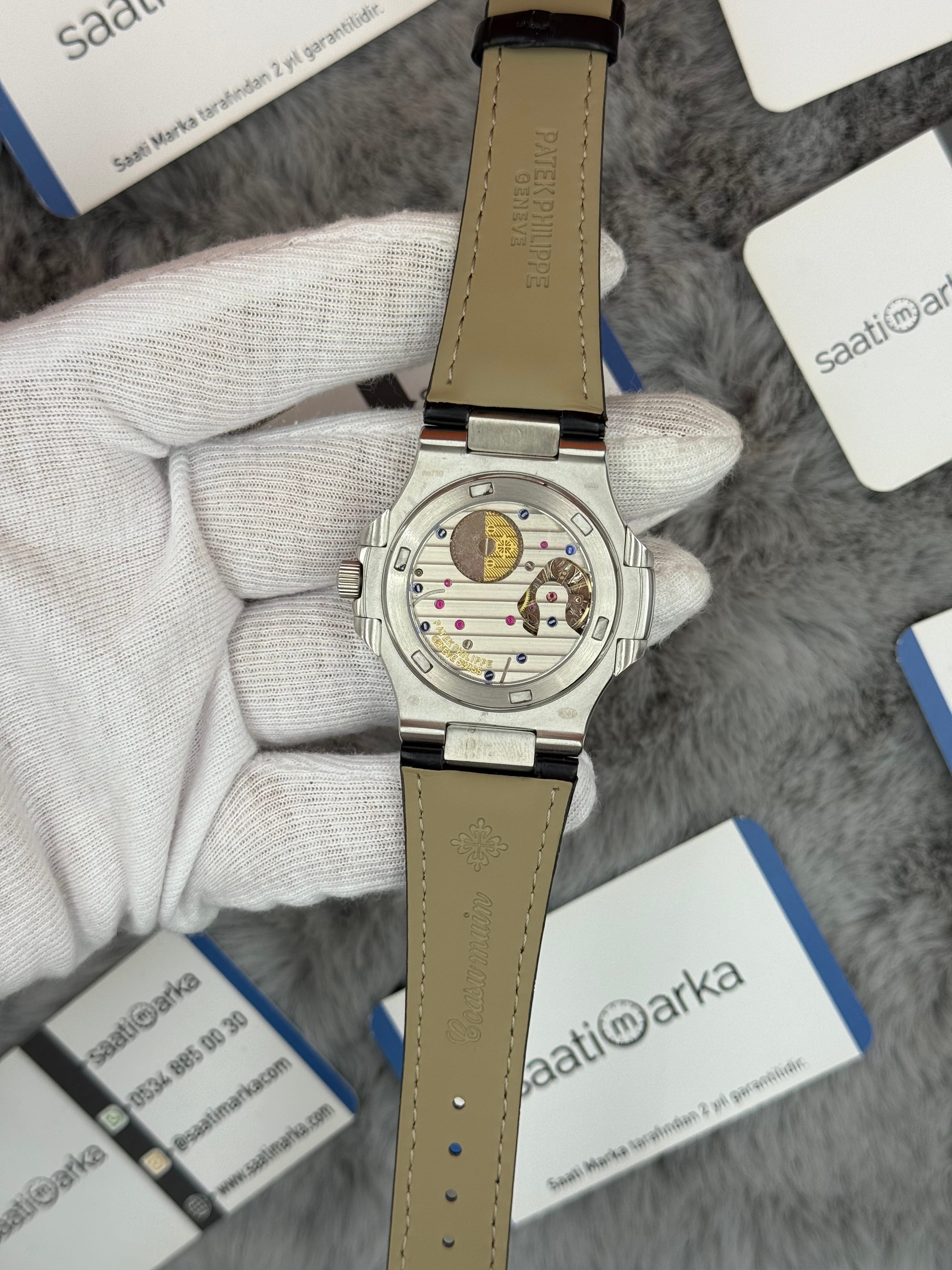 PATEK PHİLİPPE nautilus moontphase 5712 taşlı bezel gri kadran siyah deri kordon silver kasa 40mm erkek kol saati