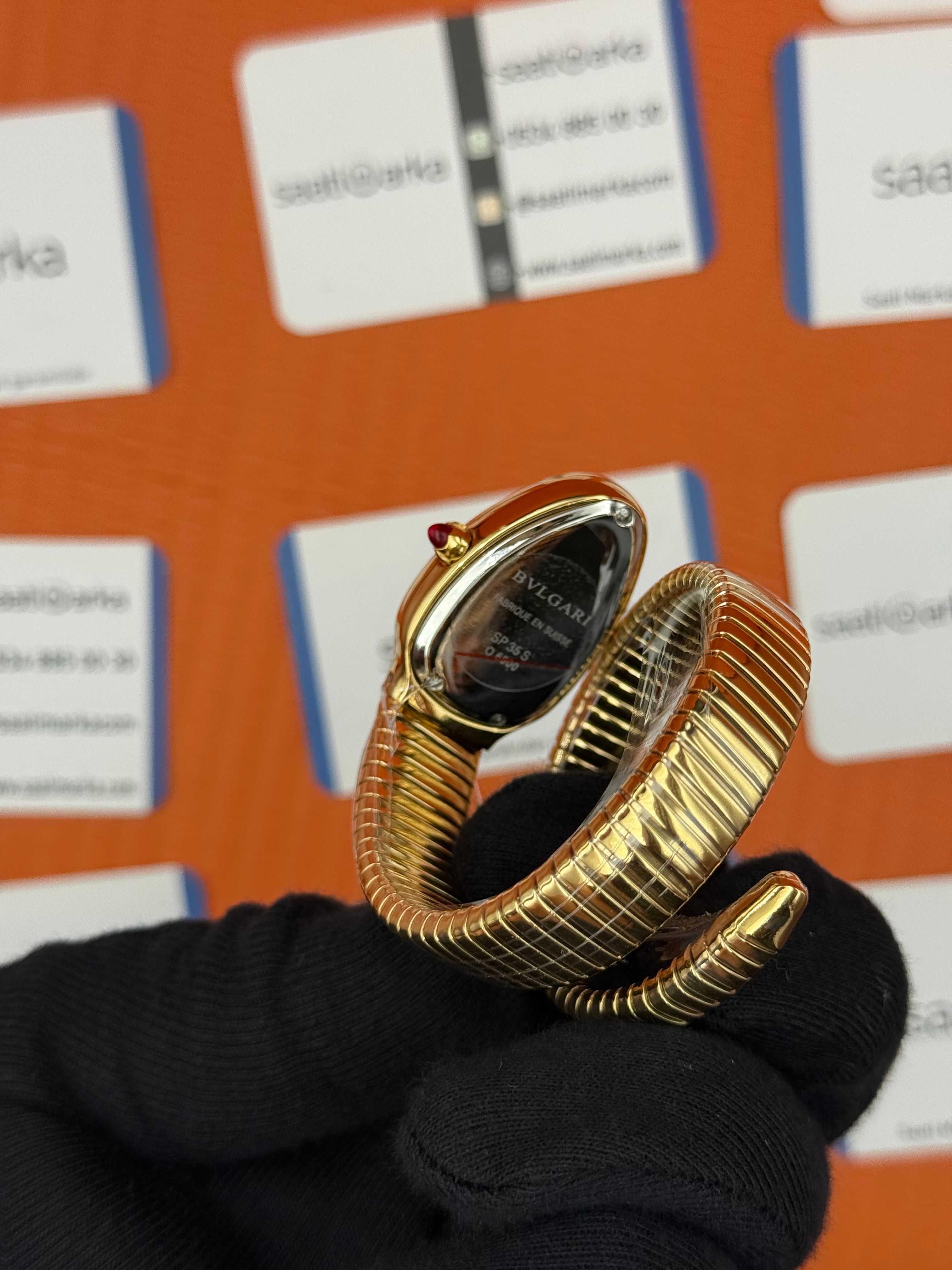 BVLGARİ serpenti tek sarma gold kordon taşlı bezel beyaz kadran kadın kol saati