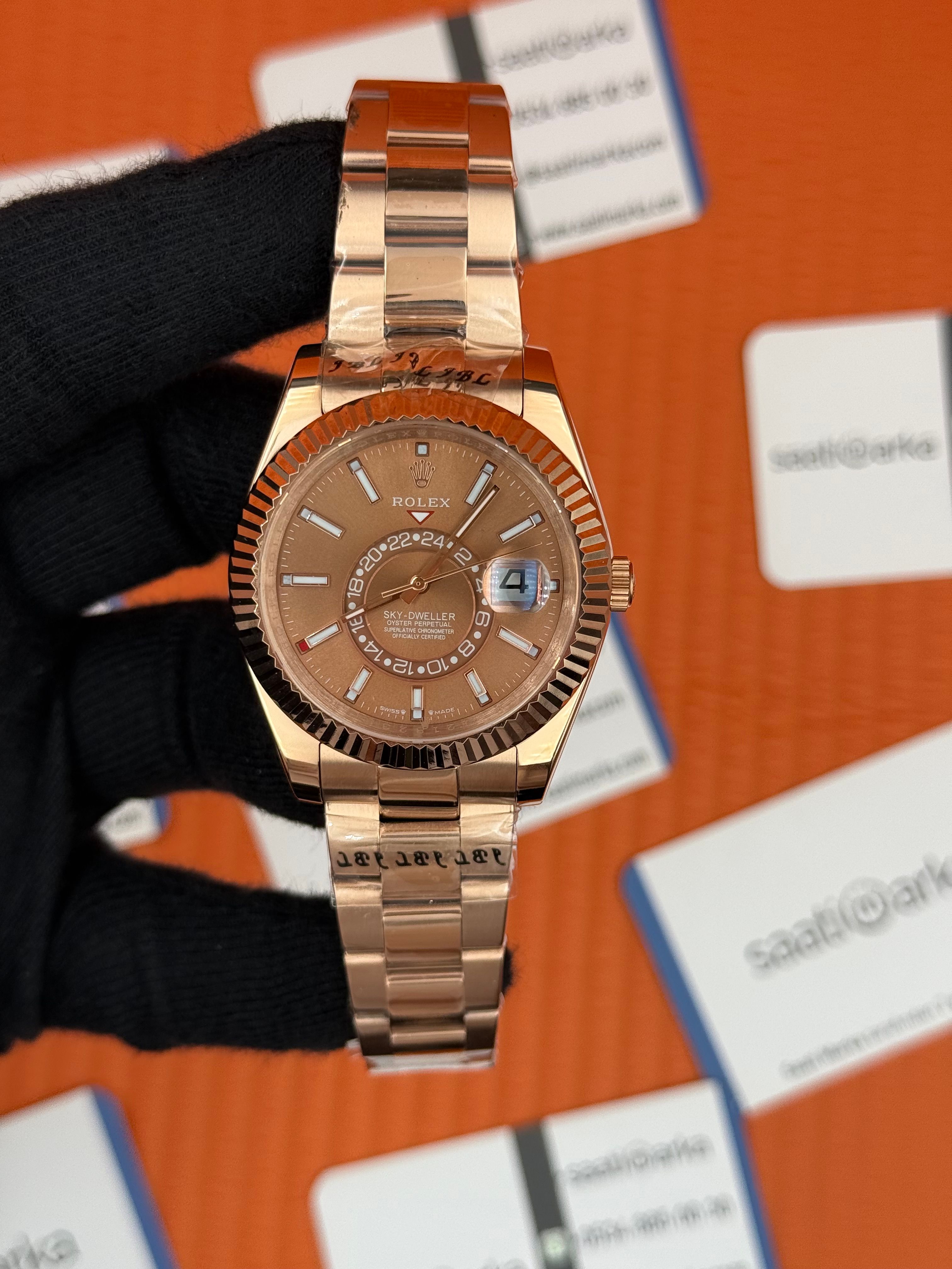 ROLEX Sky Dweller chocolate oyster kordon rose kasa-kordon