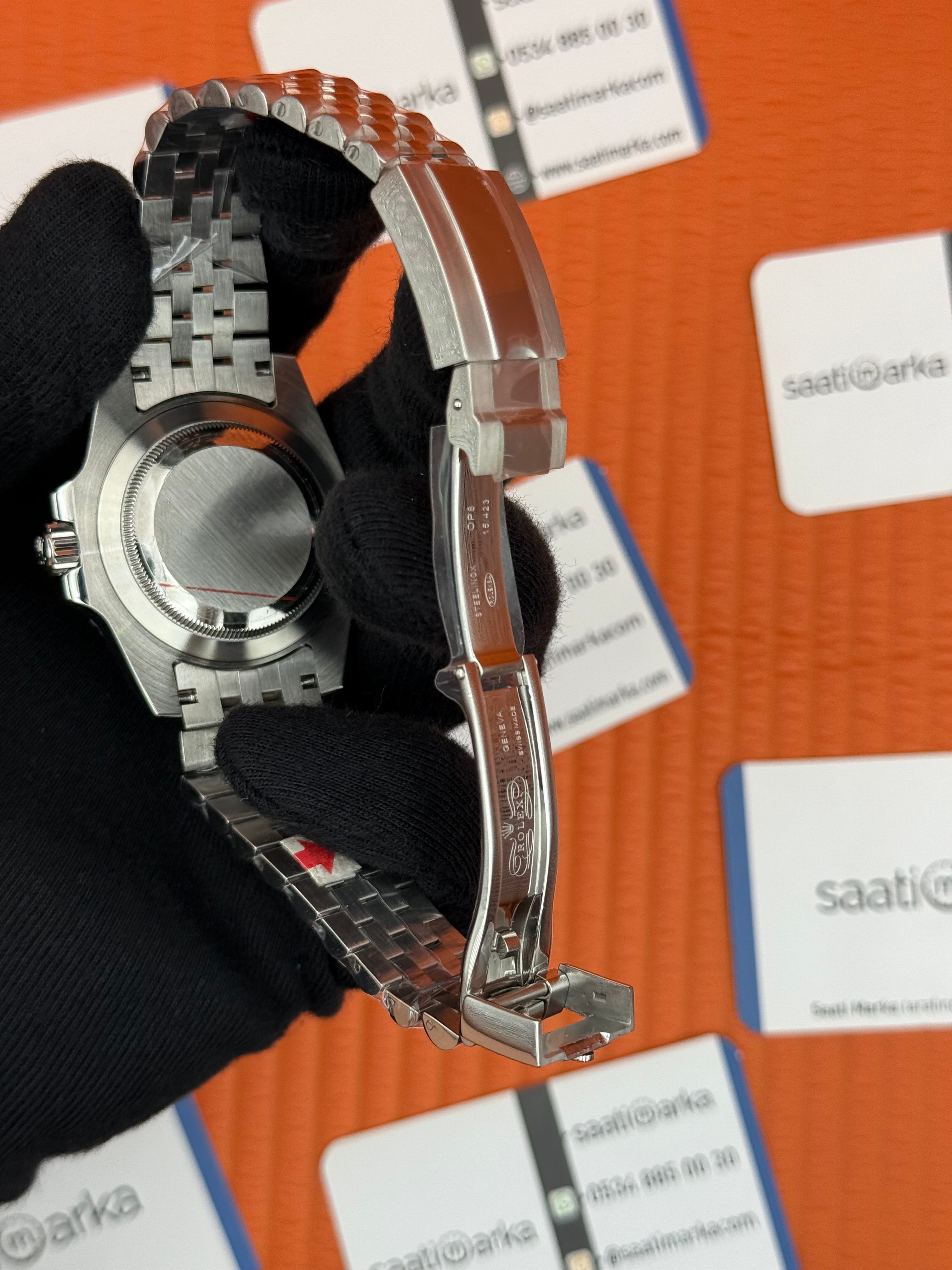 ROLEX Submariner jubilee silver kordon black bezel dial 
