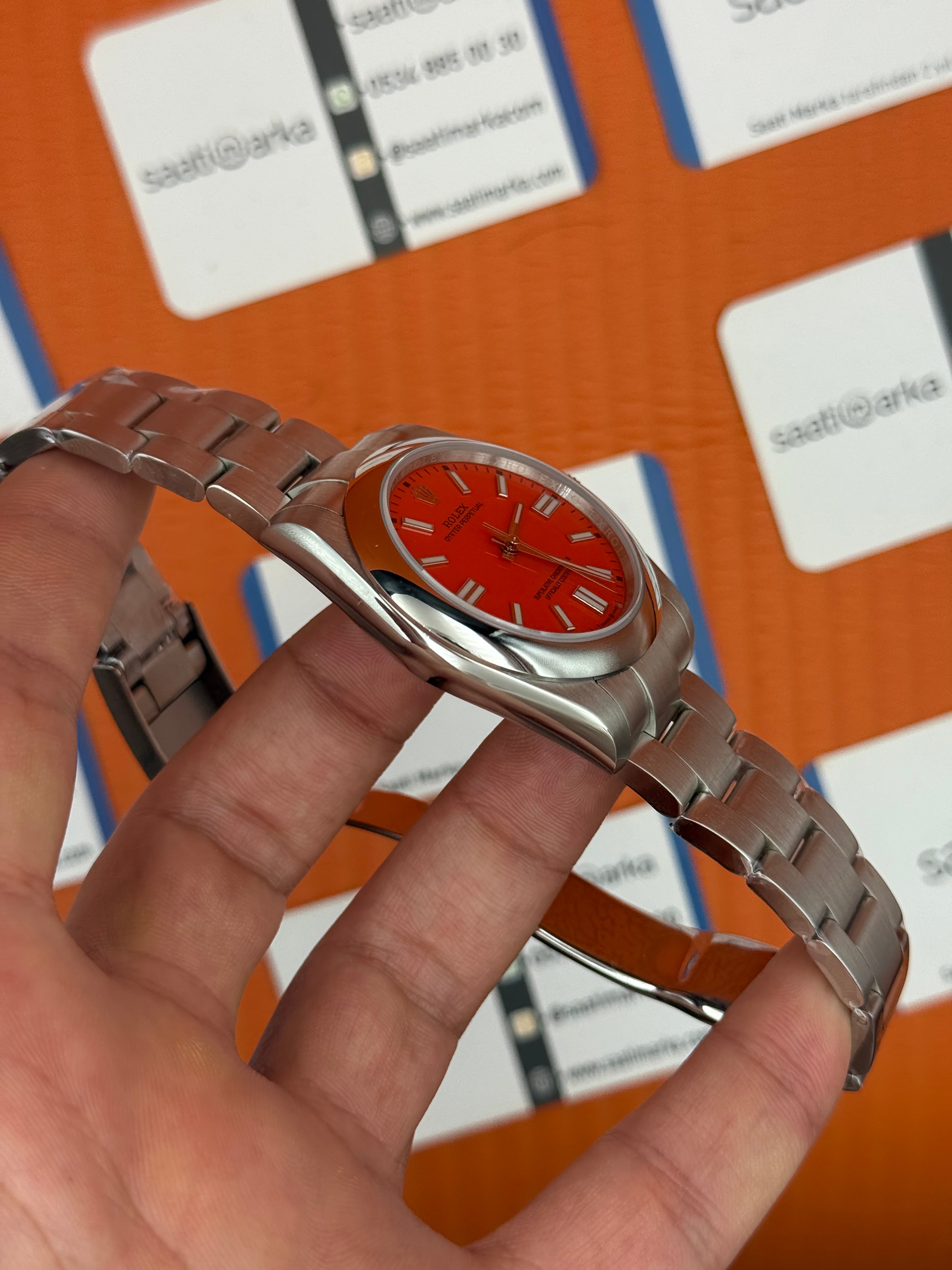 ROLEX oyster perpetual kırmızı kadran silver kasa kordon erkek kol saati