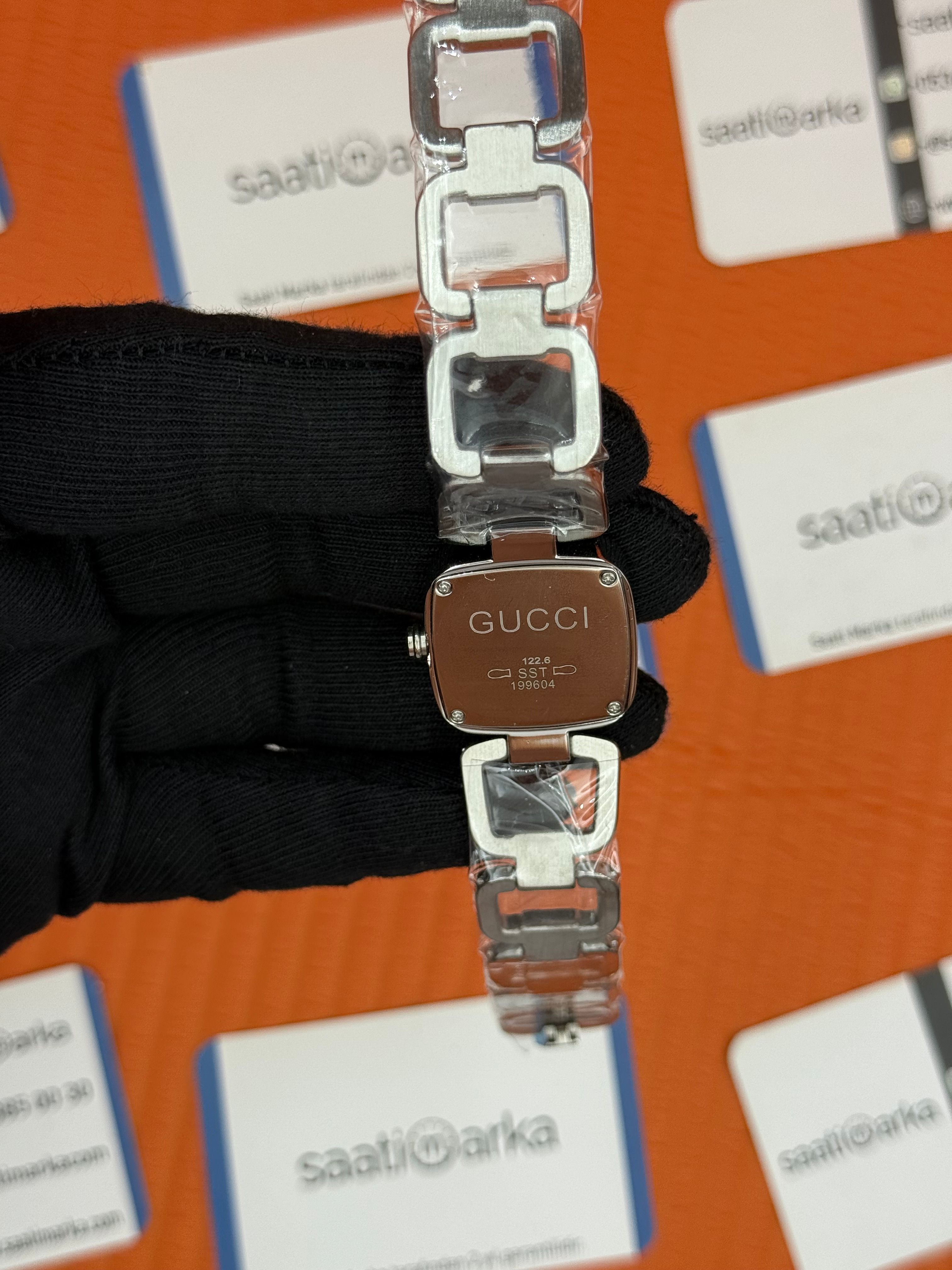 GUCCI YA125502 beyaz sedefli kadran silver kasa kordon kadın kol saati