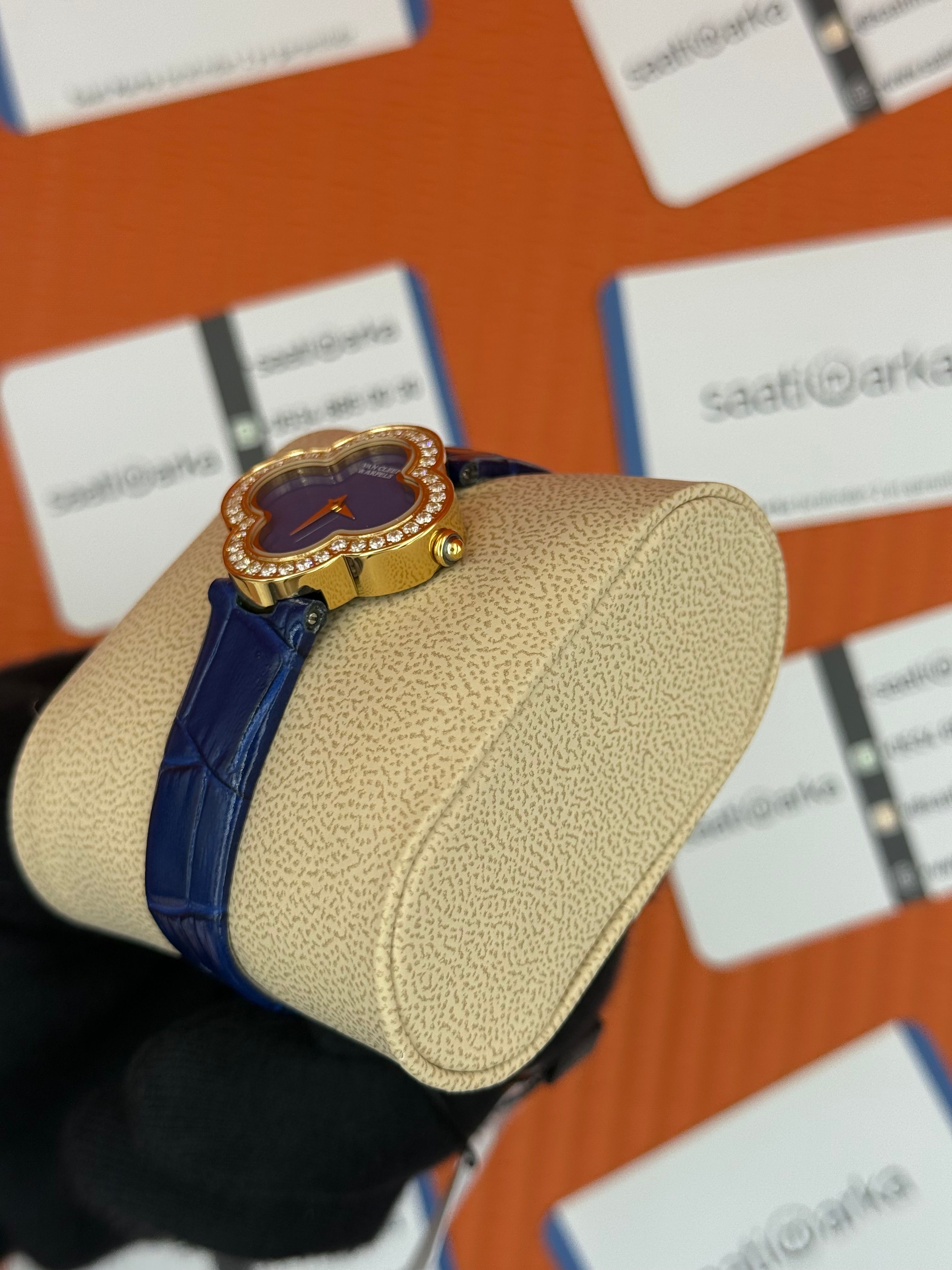 VAN CLEEF lacivert kadran lacivert deri kordon gold kasa taşlı bezel kadın kol saati