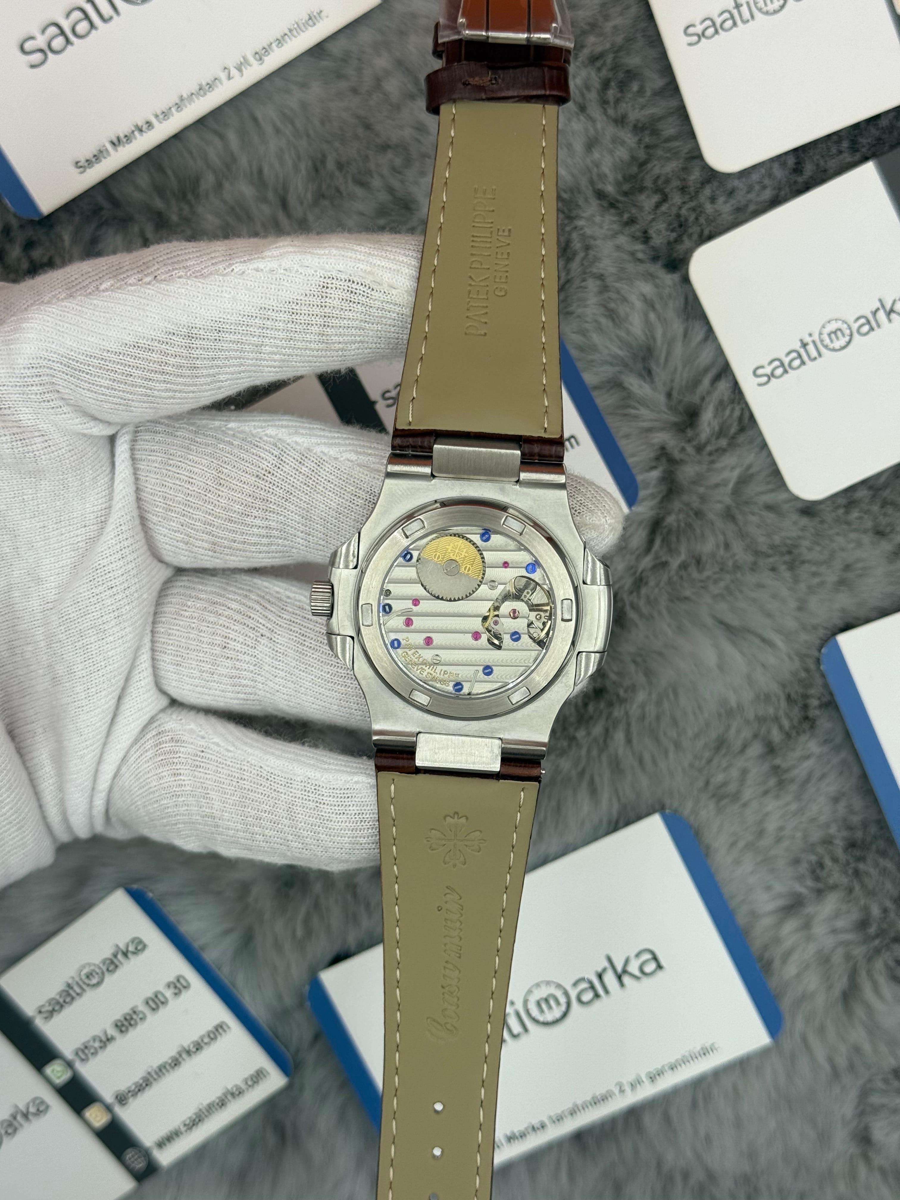 PATEK PHİLİPPE nautilus moontphase 5712 gri kadran kahverengi deri kordon silver kasa 40mm erkek kol saati
