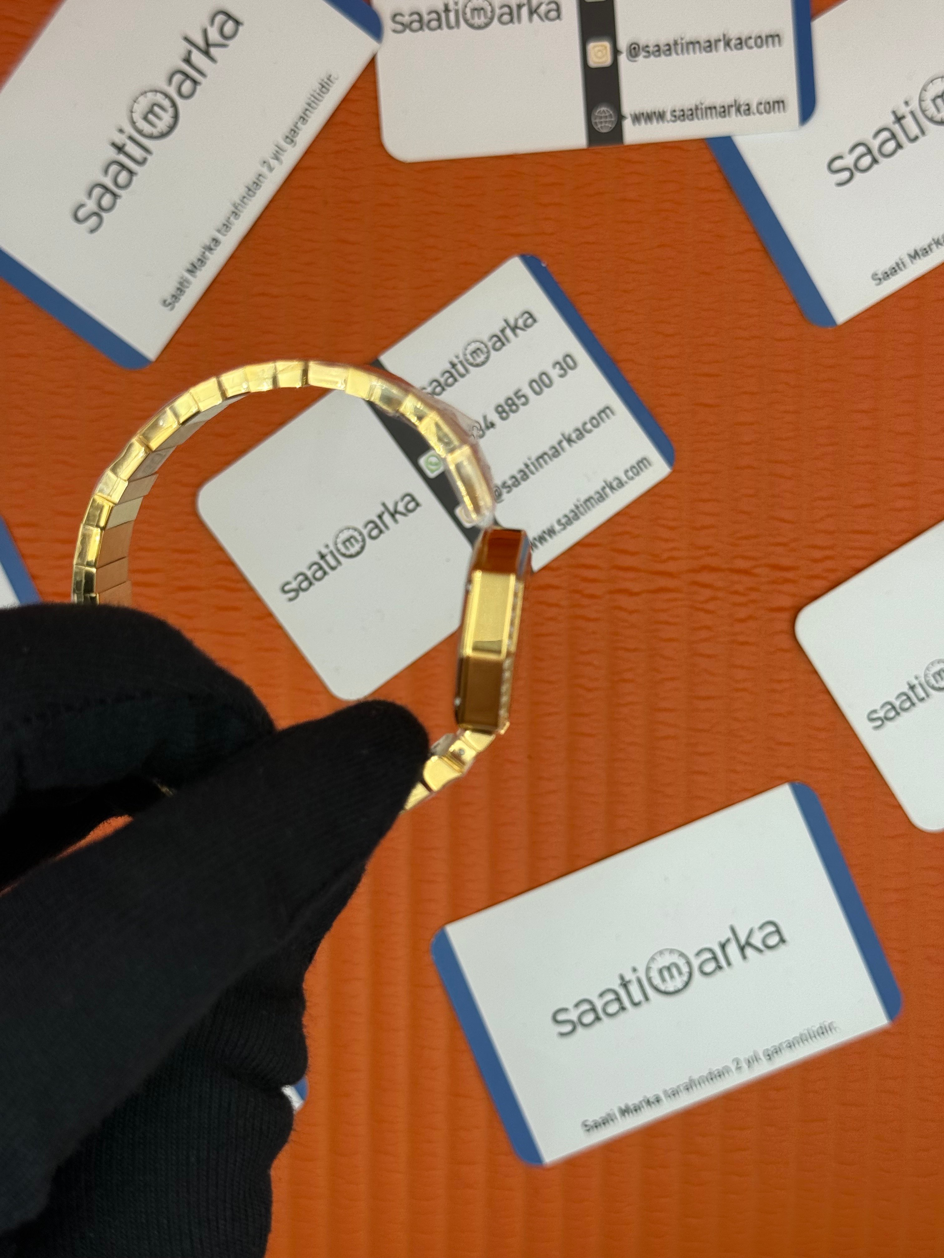 DİOR taşlı bezel yeşil kadran gold kasa kordon kadın kol saati