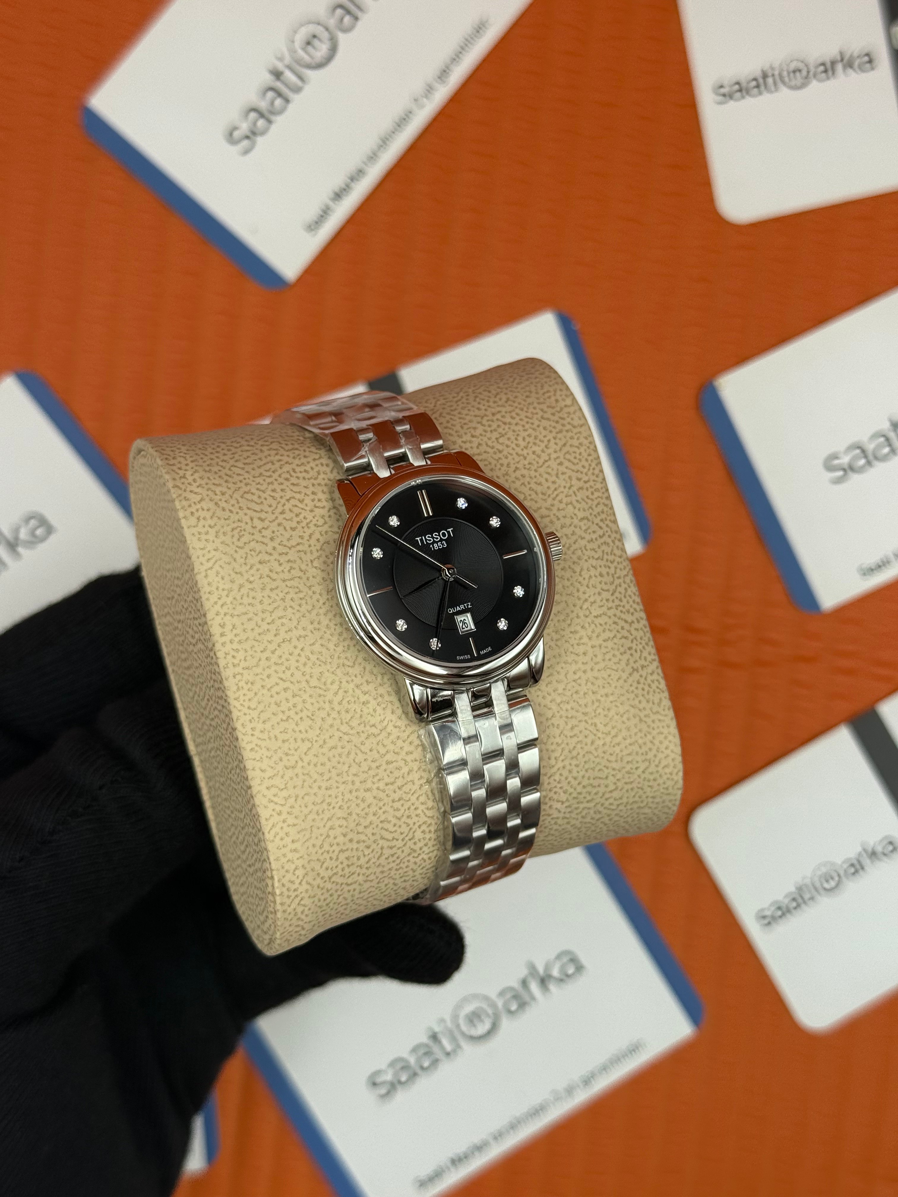 TISSOT siyah baget taşlı kadran silver kasa kordon kadın kol saati