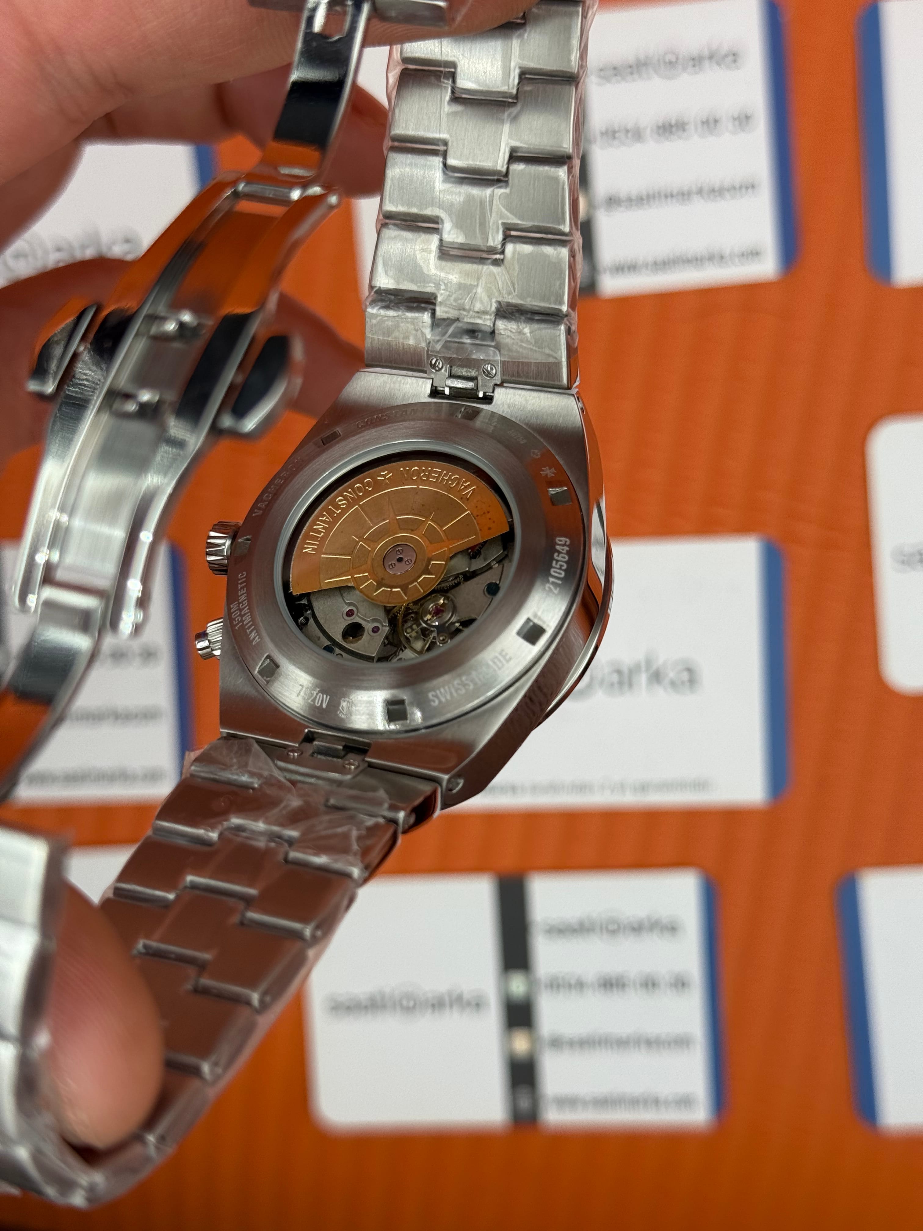 VACHERON CONSTANTIN overseas dual time 41mm beyaz kadran silver kasa kordon erkek kol saati