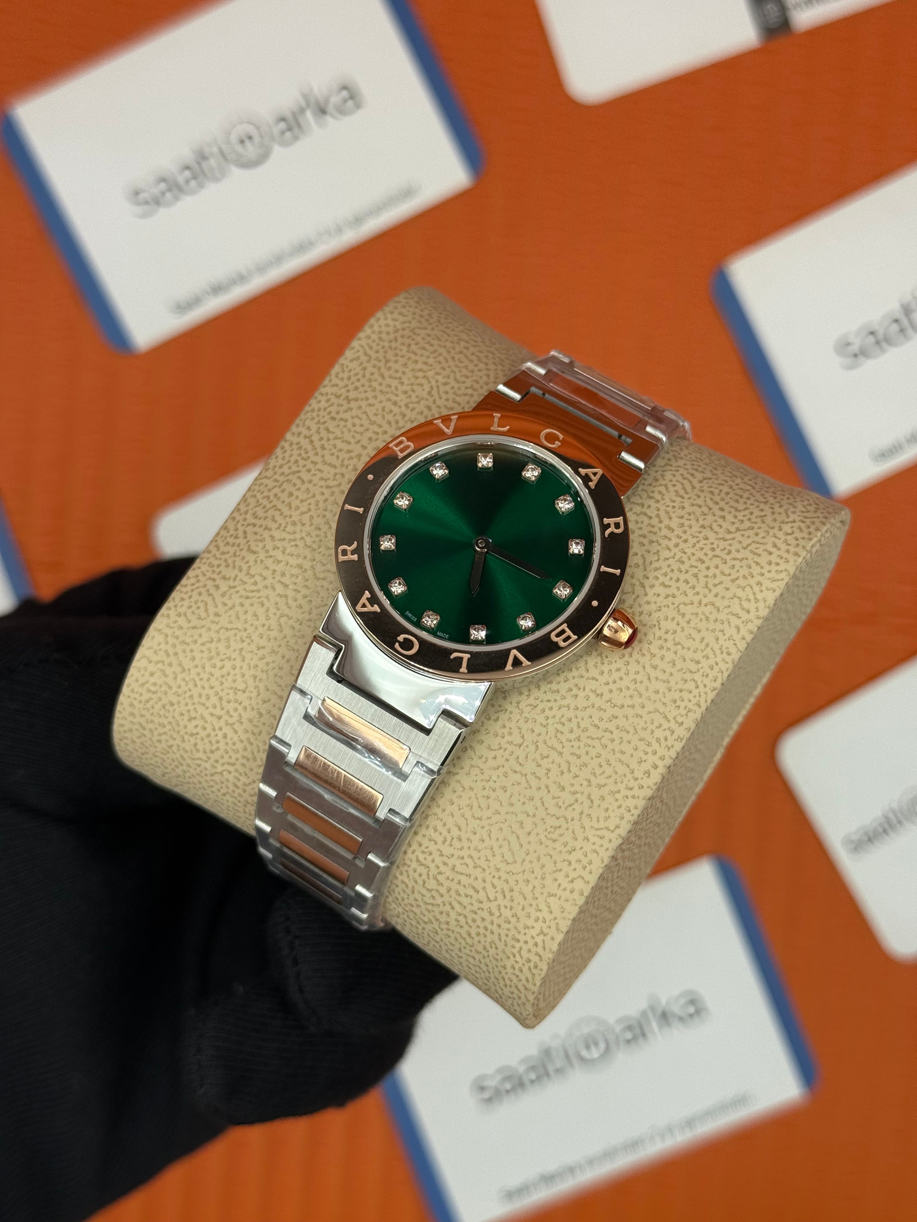 BVLGARI yeşil kadran rose bezel silver kasa kordon kadın kol saati