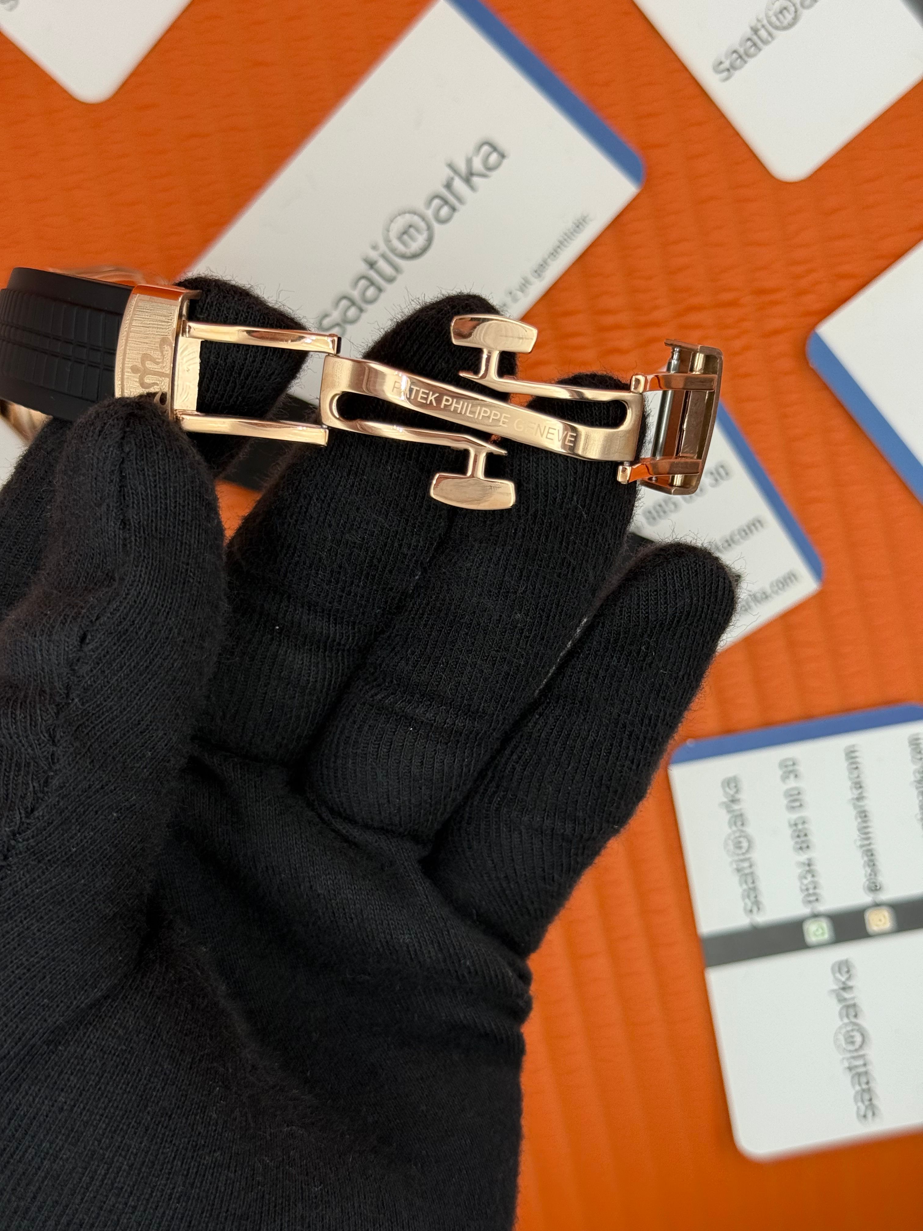 PATEK PHILIPPE AQUANAUT SİYAH KAUÇUK KORDON SİYAH KADRAN ROSE KASA 