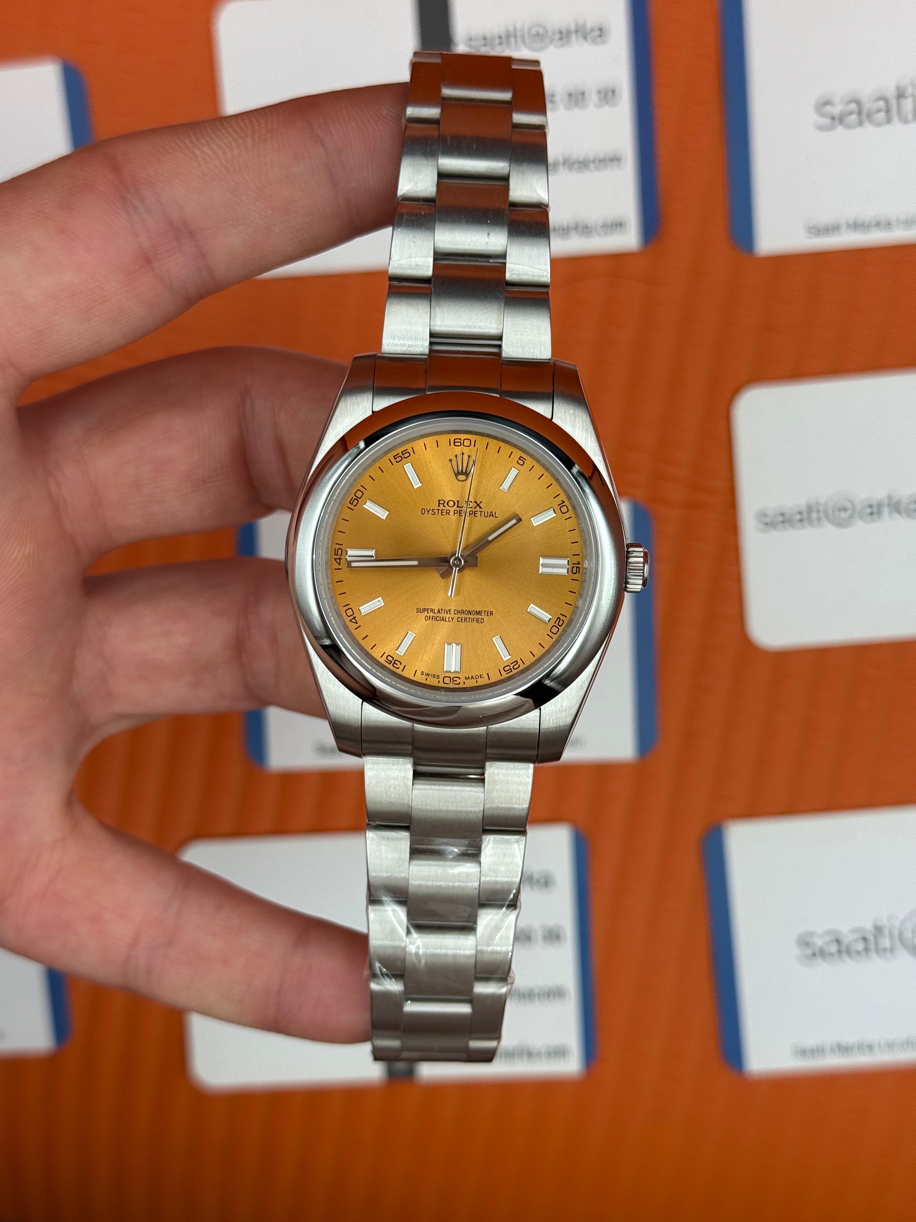 ROLEX oyster perpetual şampanya kadran silver kasa kordon erkek kol saati