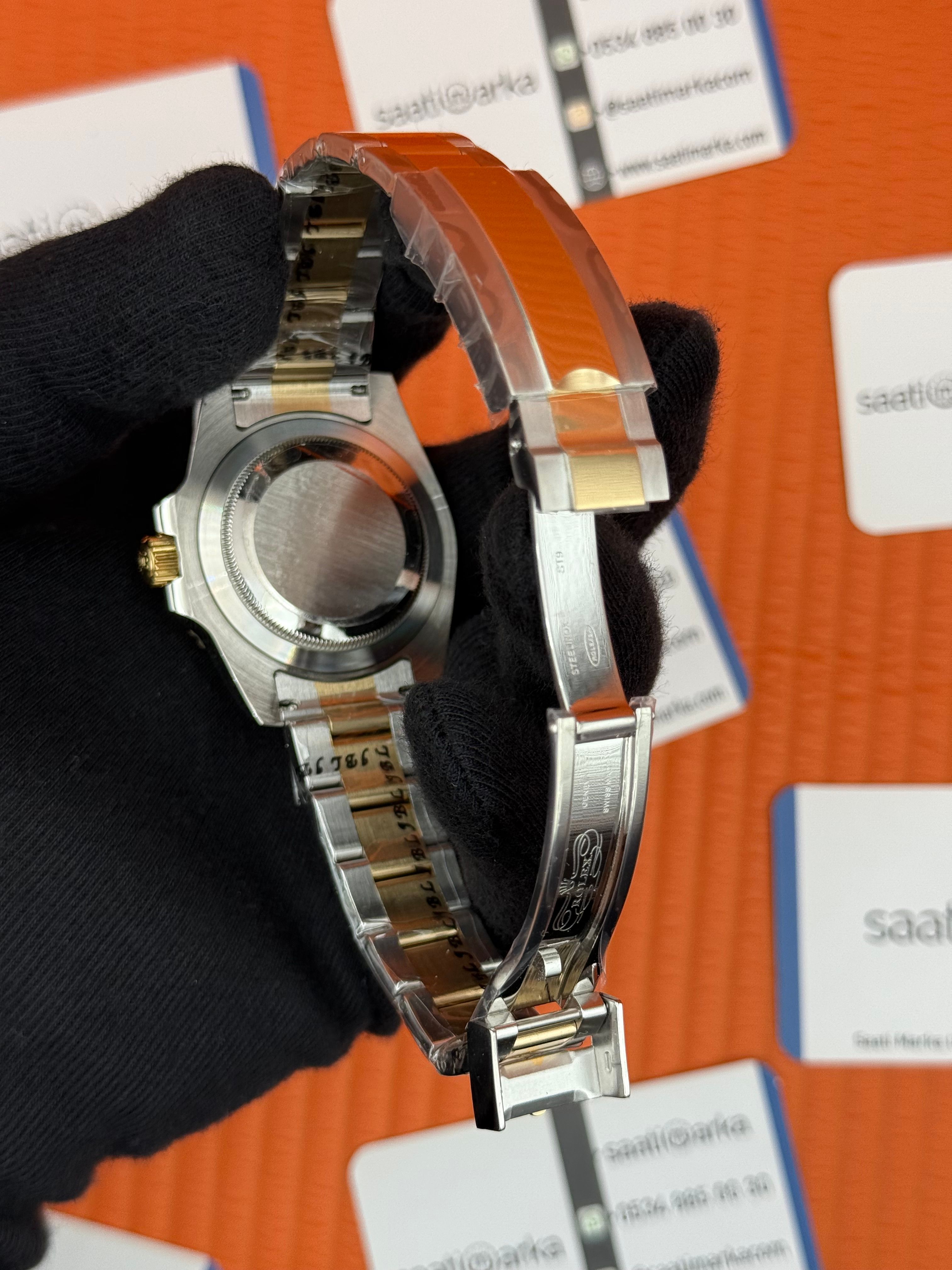ROLEX Submariner oyster gold silver blue dial 