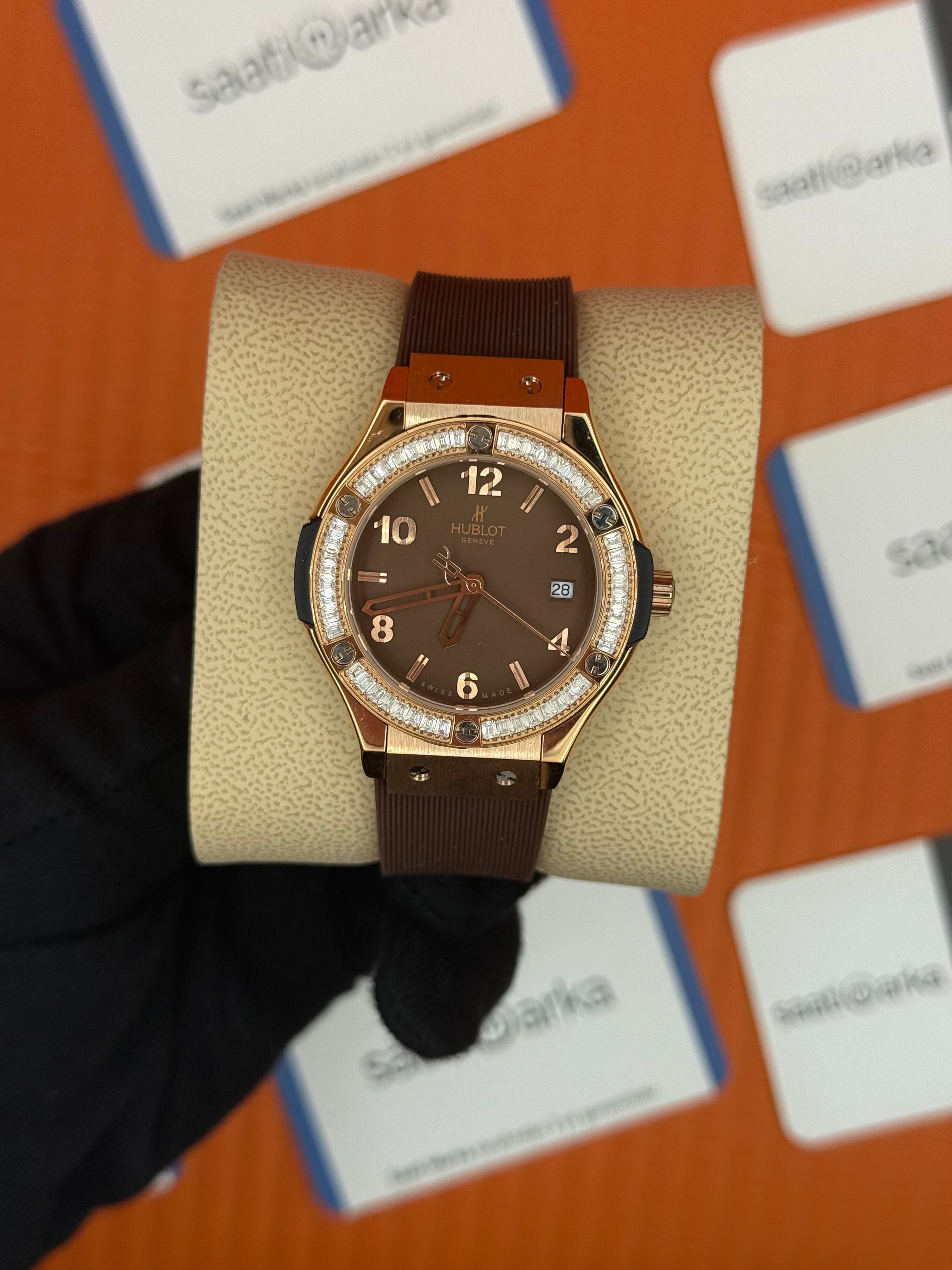 HUBLOT taşlı bezel kahverengi kadran rose kasa kahverengi kauçuk kordon kadın kol saati