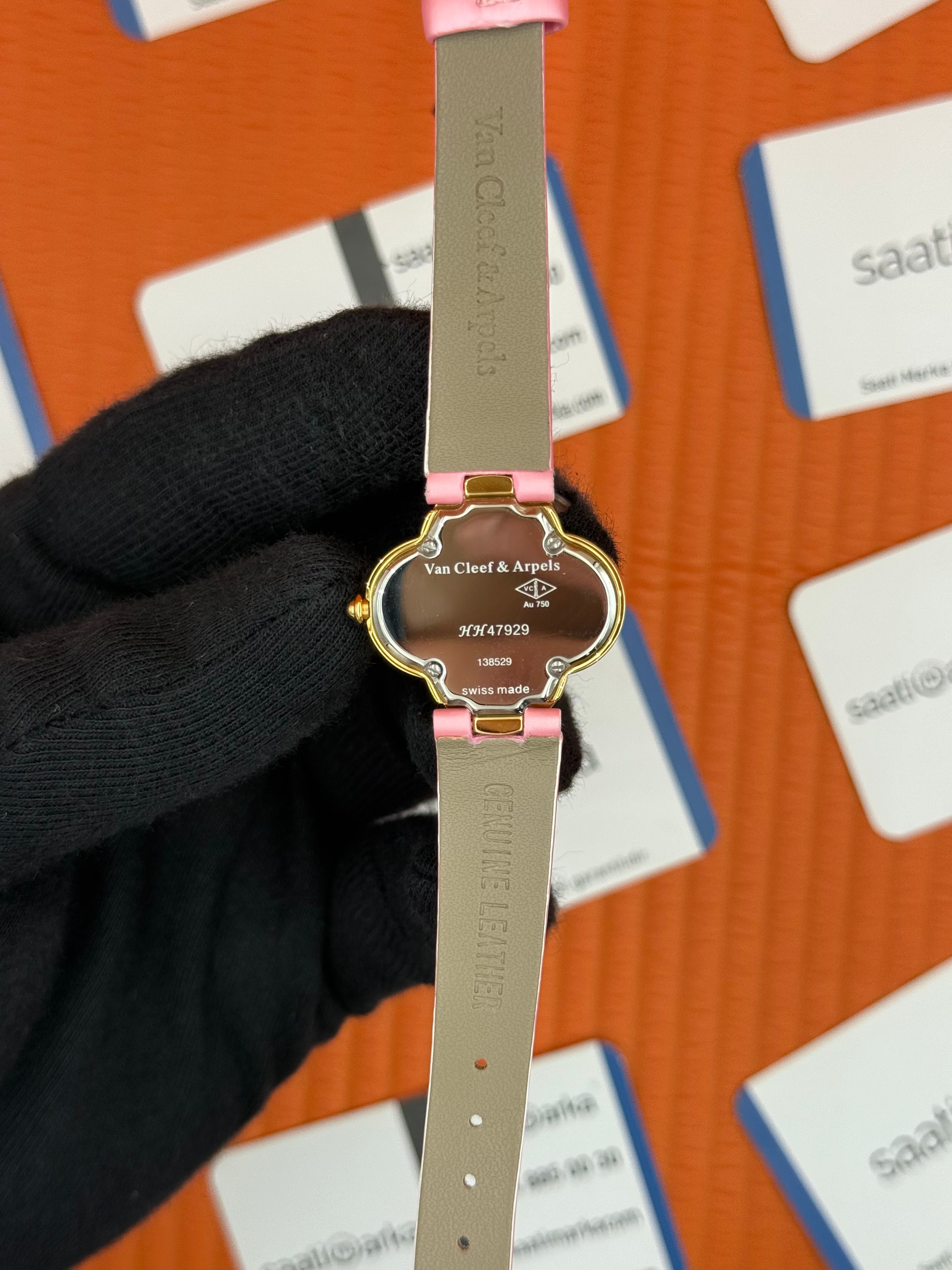 VAN CLEEF beyaz kadran pembe deri kordon gold kasa taşlı bezel kadın kol saati