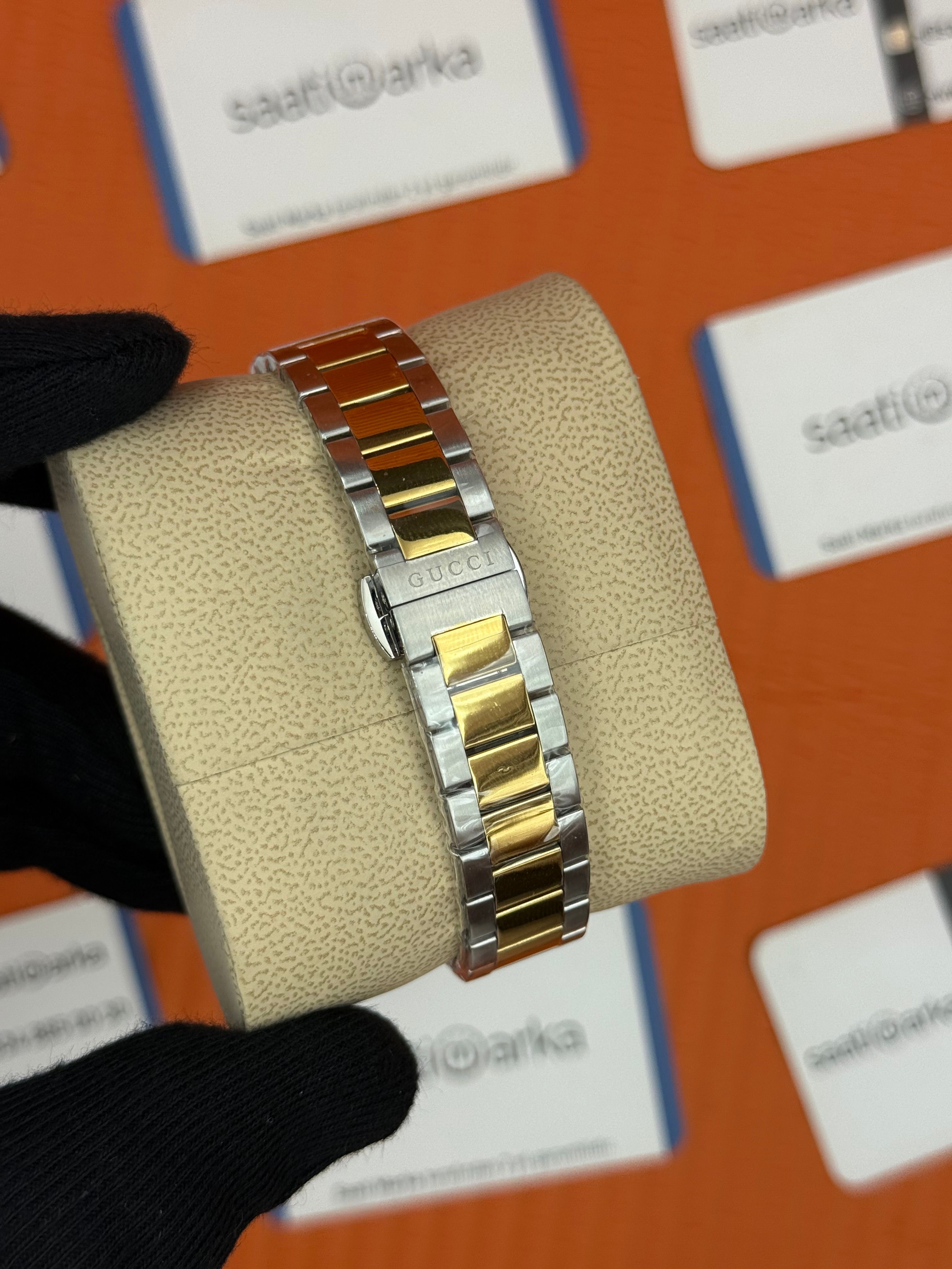 GUCCI sarı kadran gold silver kasa-kordon kadın kol saati
