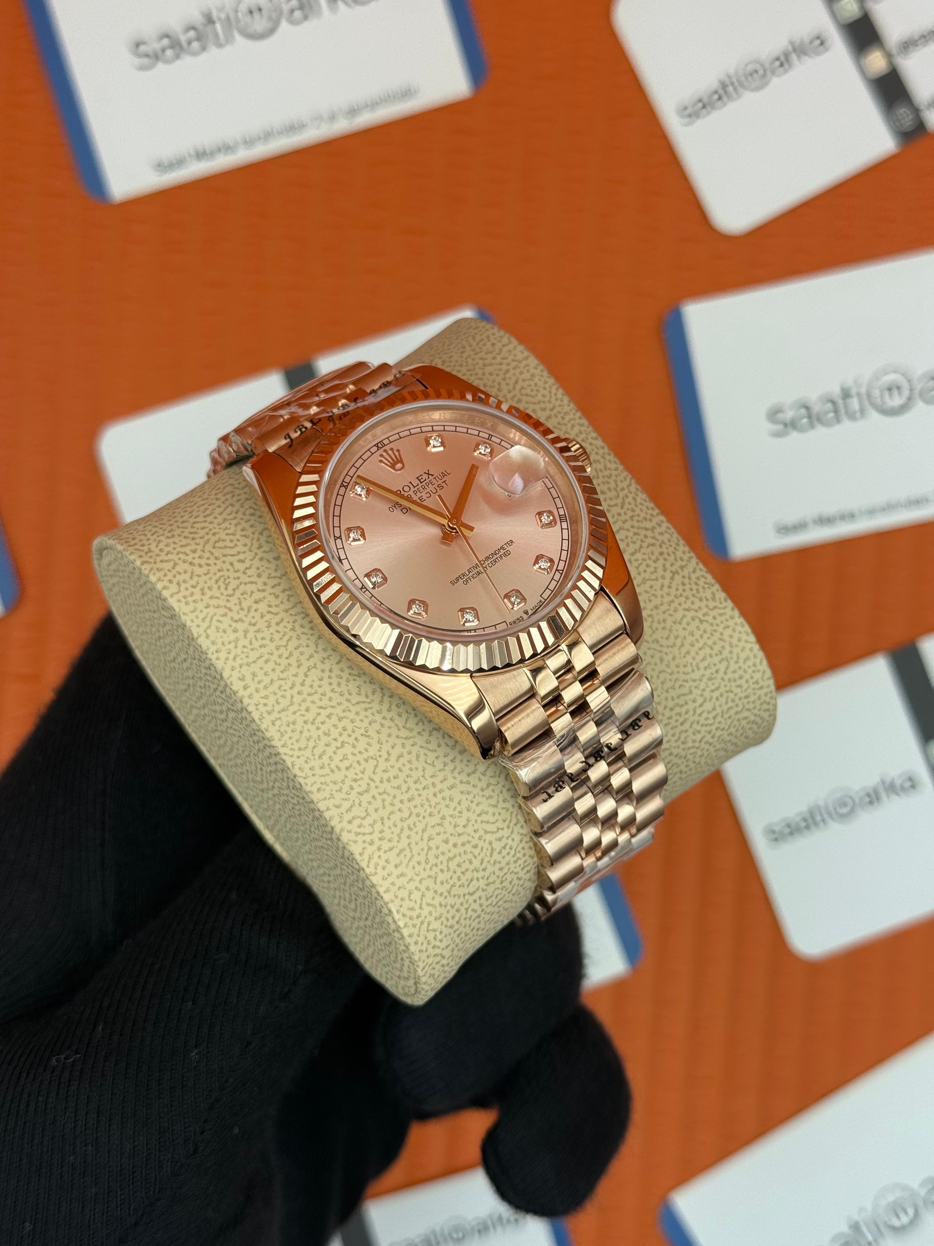 ROLEX Datejust baget taşlı rose dial rose jubilee kordon