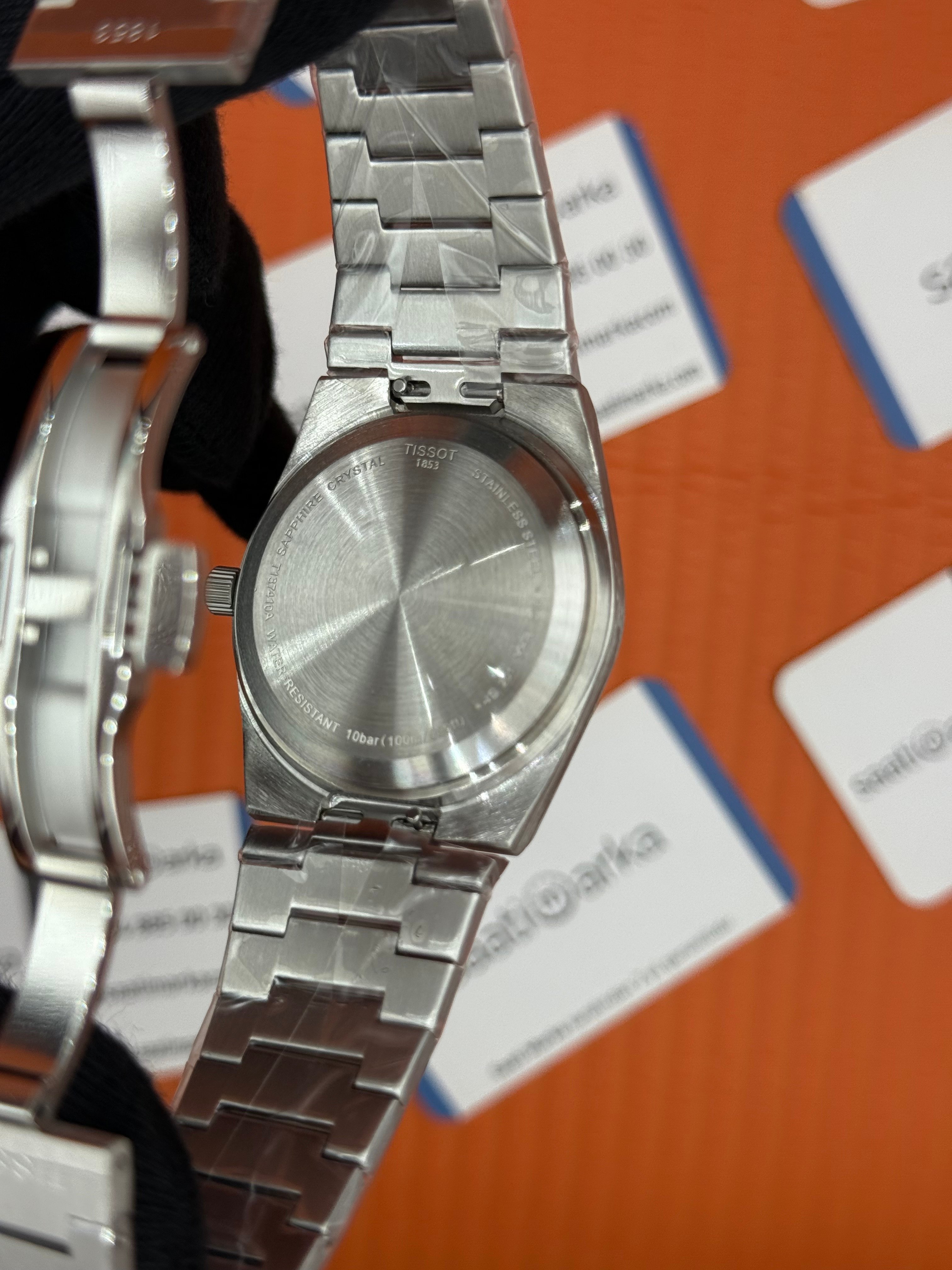 TISSOT PRX 40MM beyaz kadran silver kasa kordon erkek kol saati