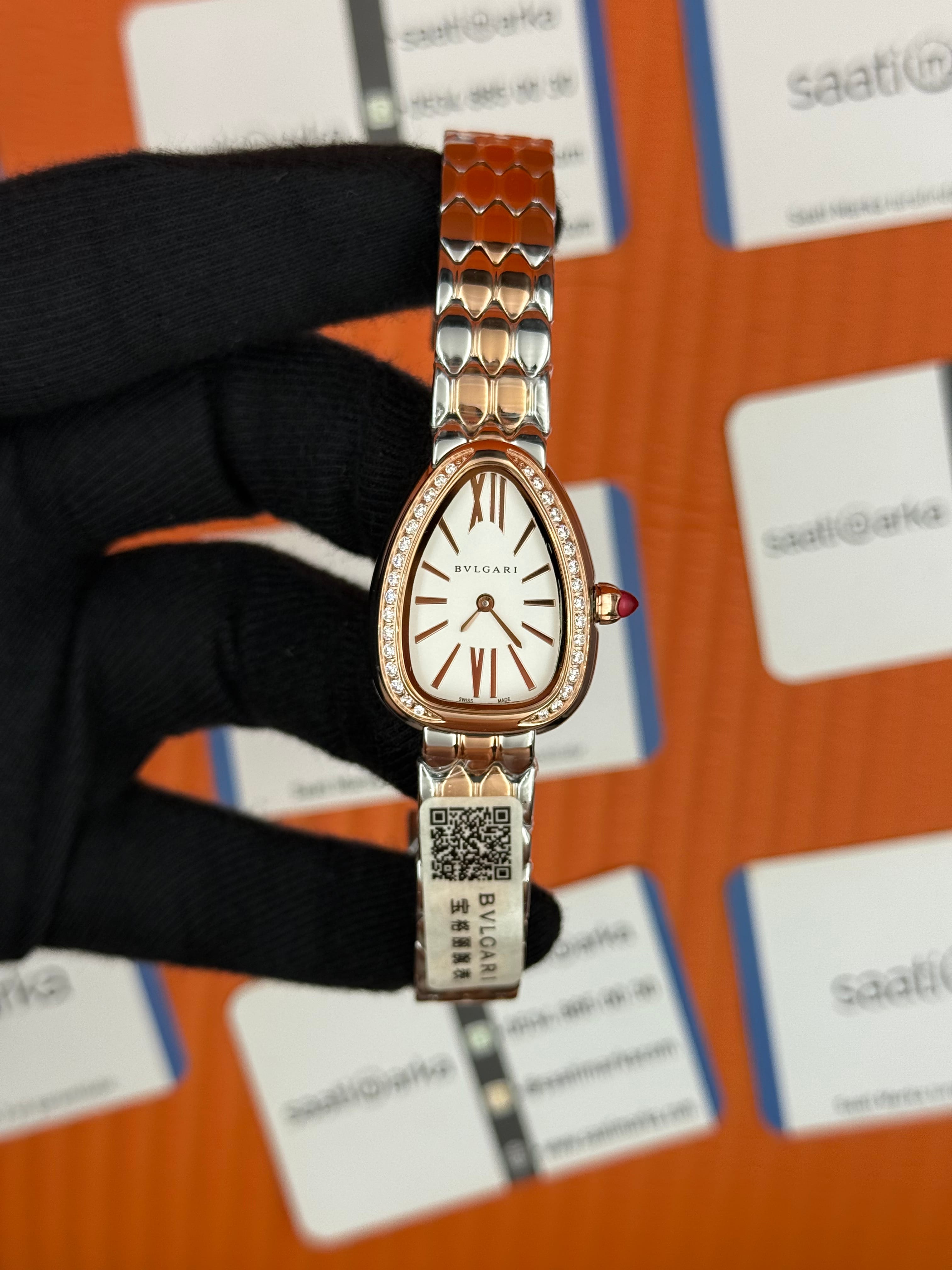 BVLGARİ serpenti seduttori taşlı bezel beyaz kadran rose kasa kordon kadın kol saati