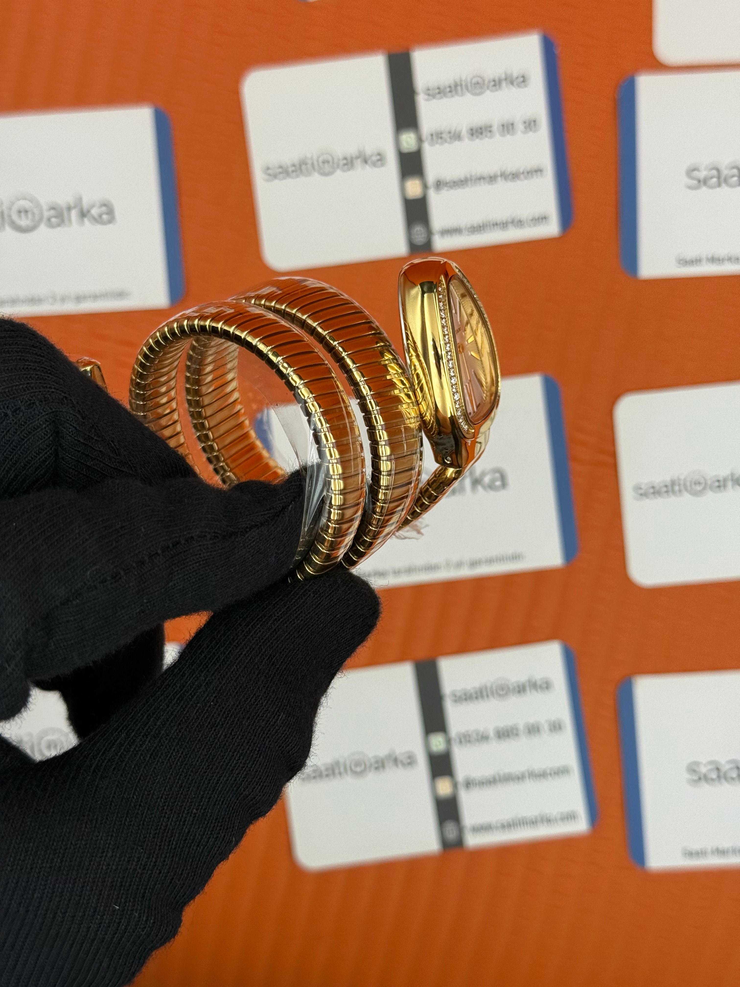 BVLGARİ serpenti çift sarma gold kordon taşlı bezel beyaz kadran kadın kol saati
