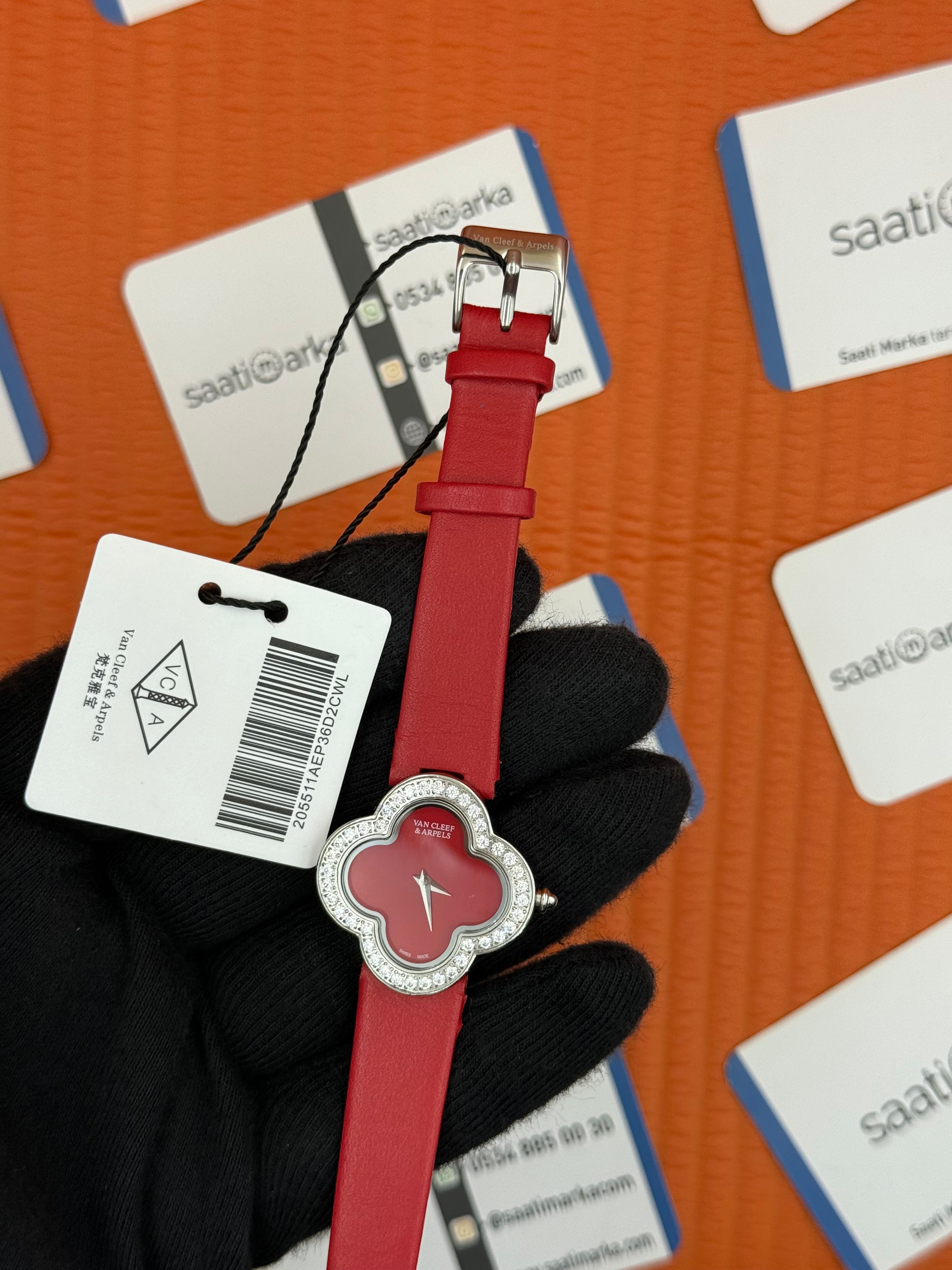 VAN CLEEF kırmızı kadran kırmızı deri kordon taşlı bezel silver kasa kadın kol saati