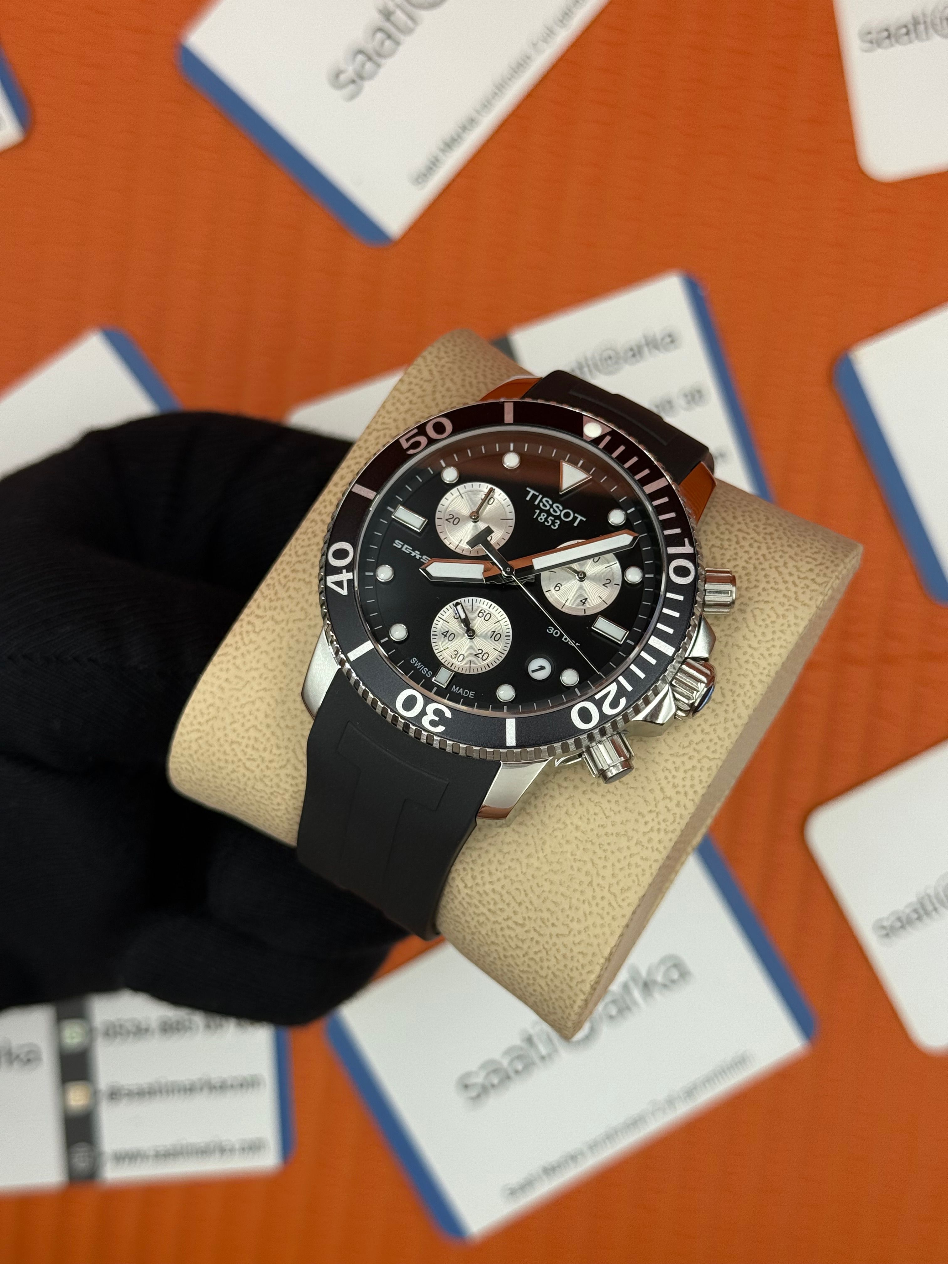 TISSOT siyah kauçuk kordon siyah kadran silver kasa erkek kol saati