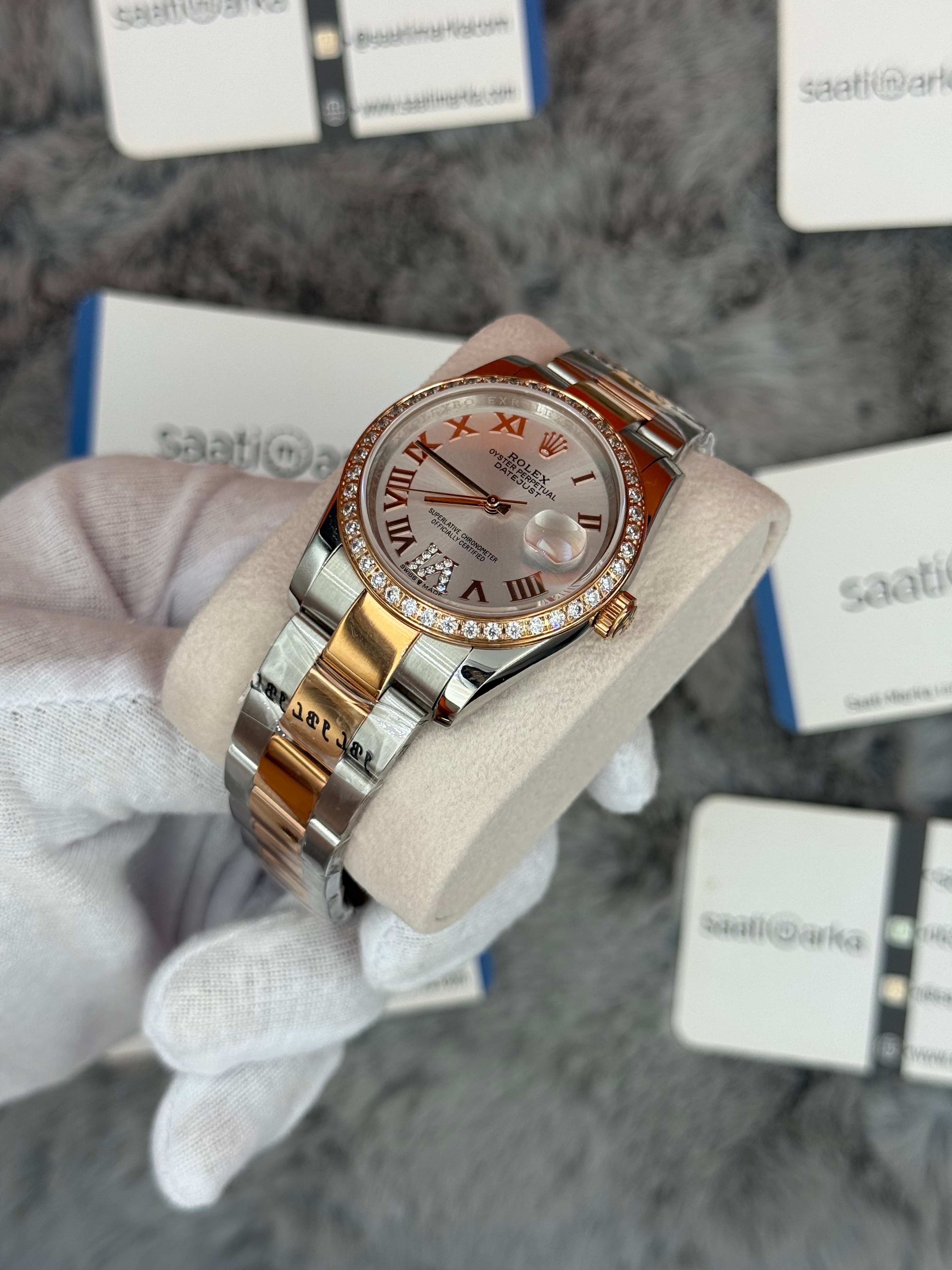 ROLEX Datejust 36mm beyaz kadran taşlı bezel silver kasa rose silver kordon 