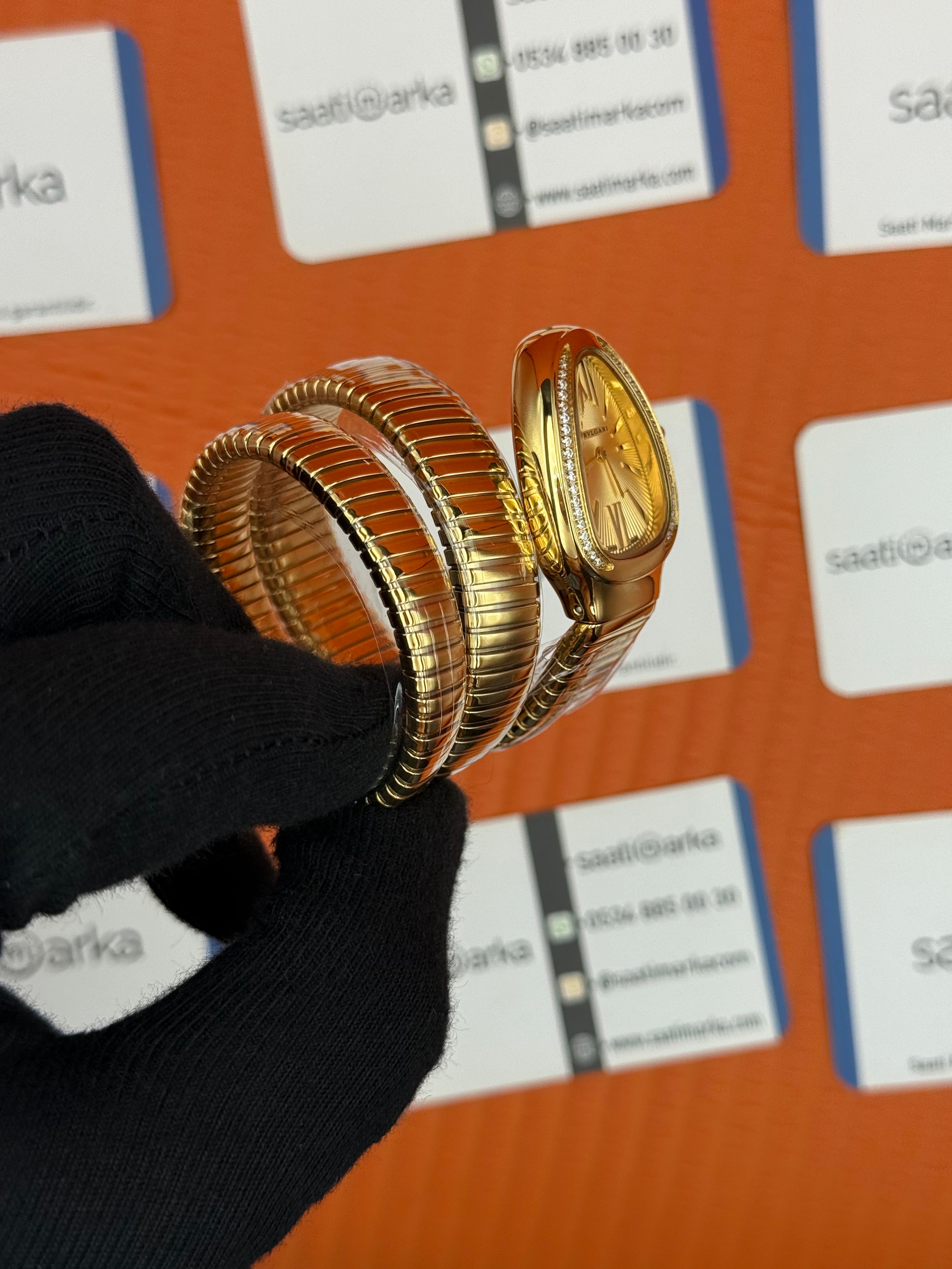 BVLGARİ serpenti çift sarma gold kordon taşlı bezel şampanya kadran kadın kol saati