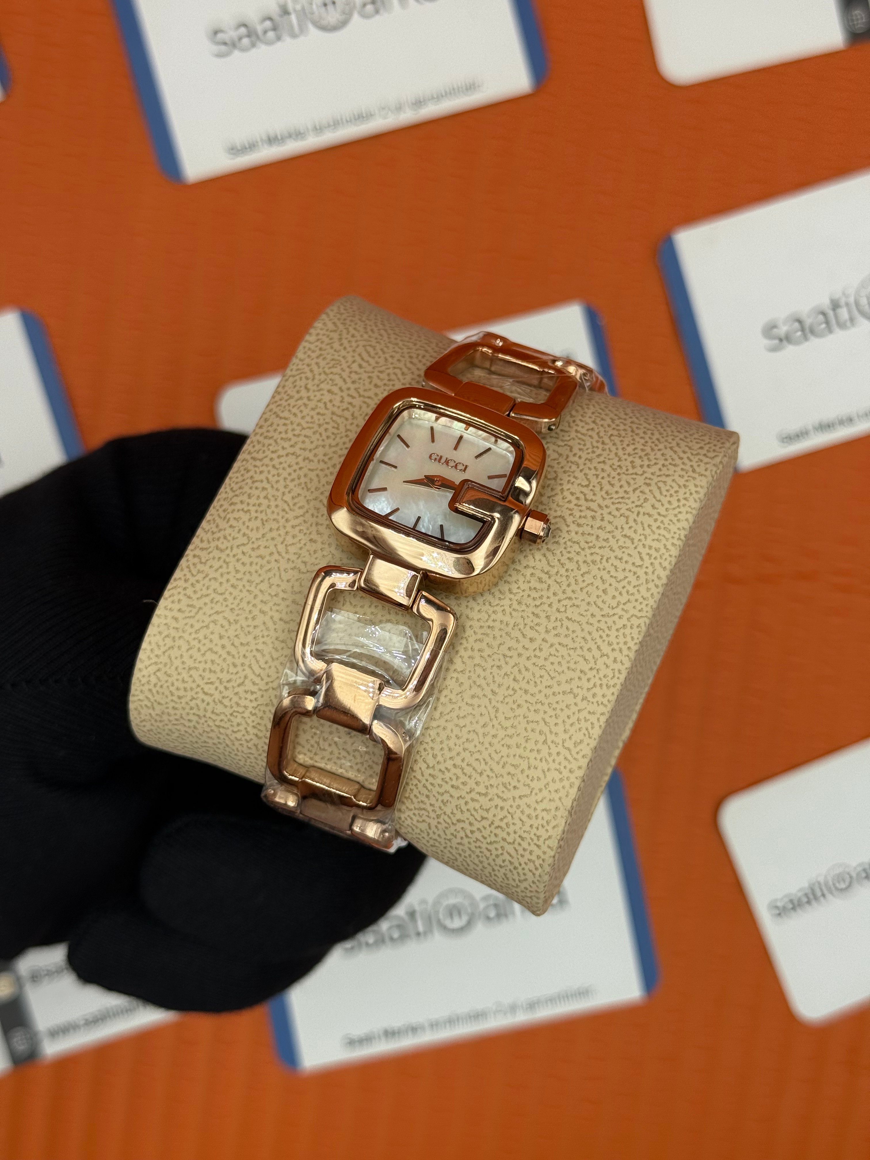 GUCCI YA BEYAZ SEDEFLİ KADRAN ROSE KASA KORDON KADI  KOL SAATİ