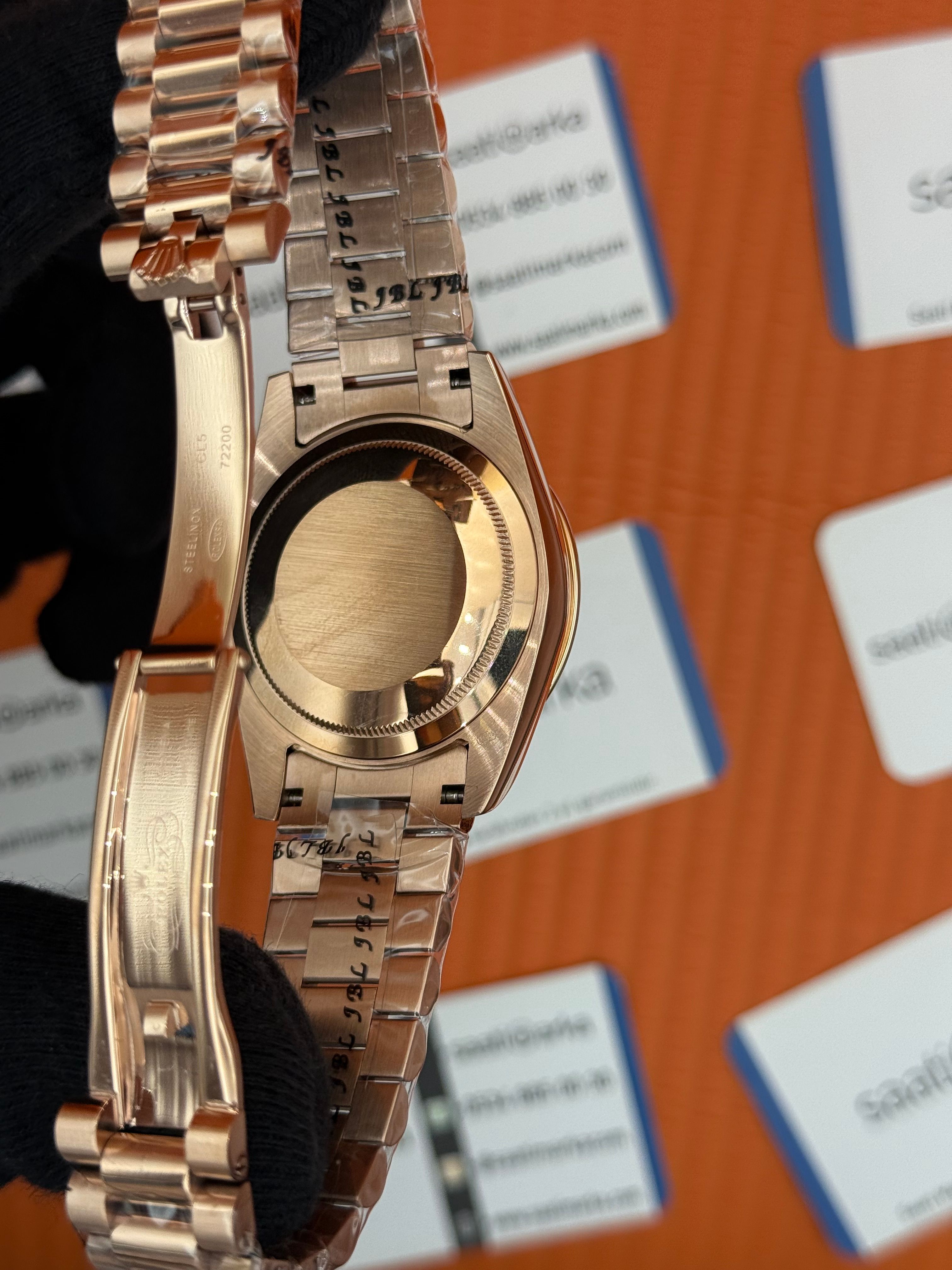 ROLEX Day Date taşlı bezel roma rakamlı siyah kadran rose kasa-kordon oyster