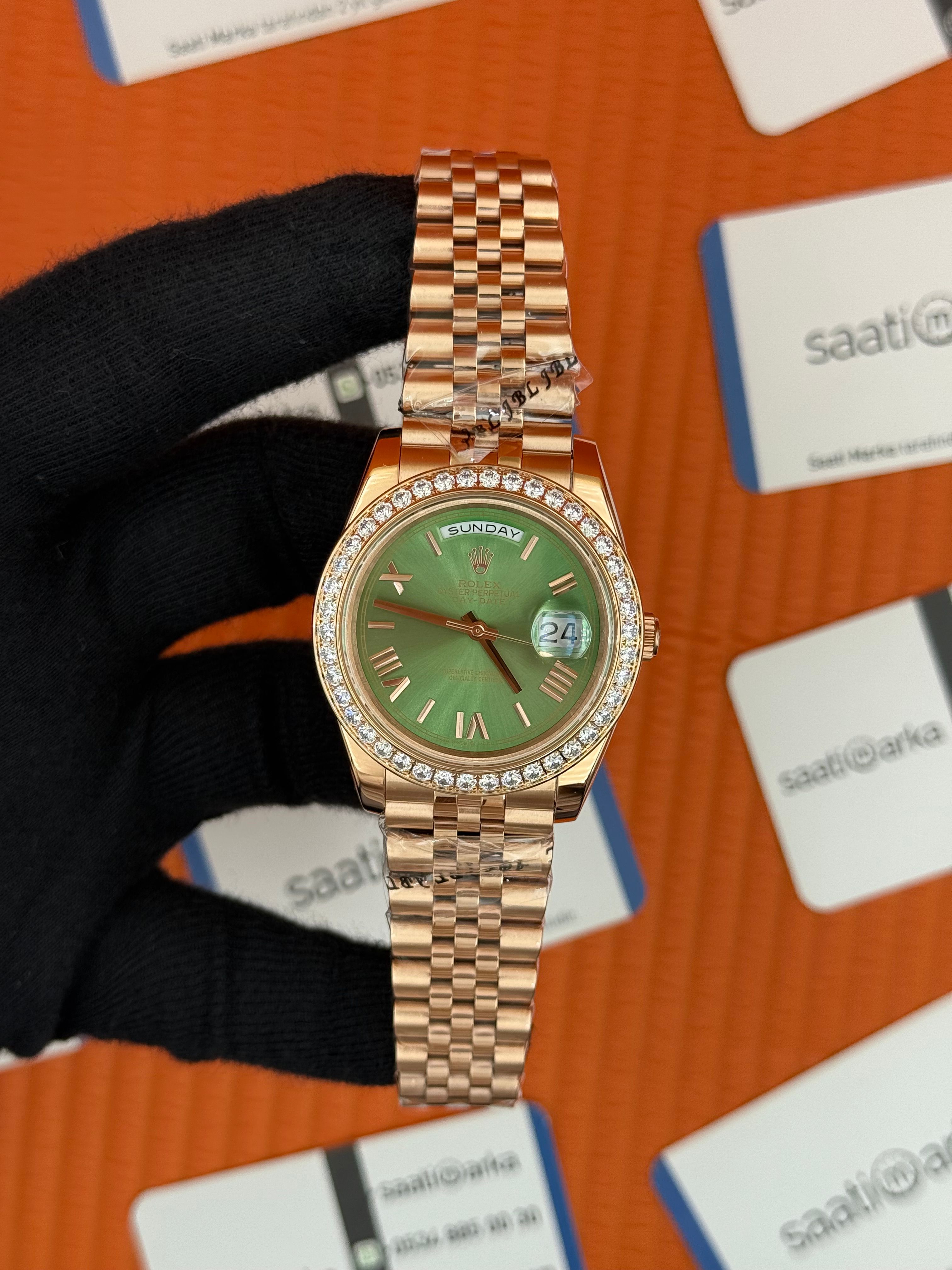 ROLEX Day Date taşlı bezel  roma rakamlı yeşil kadran rose kasa-kordon jubilee