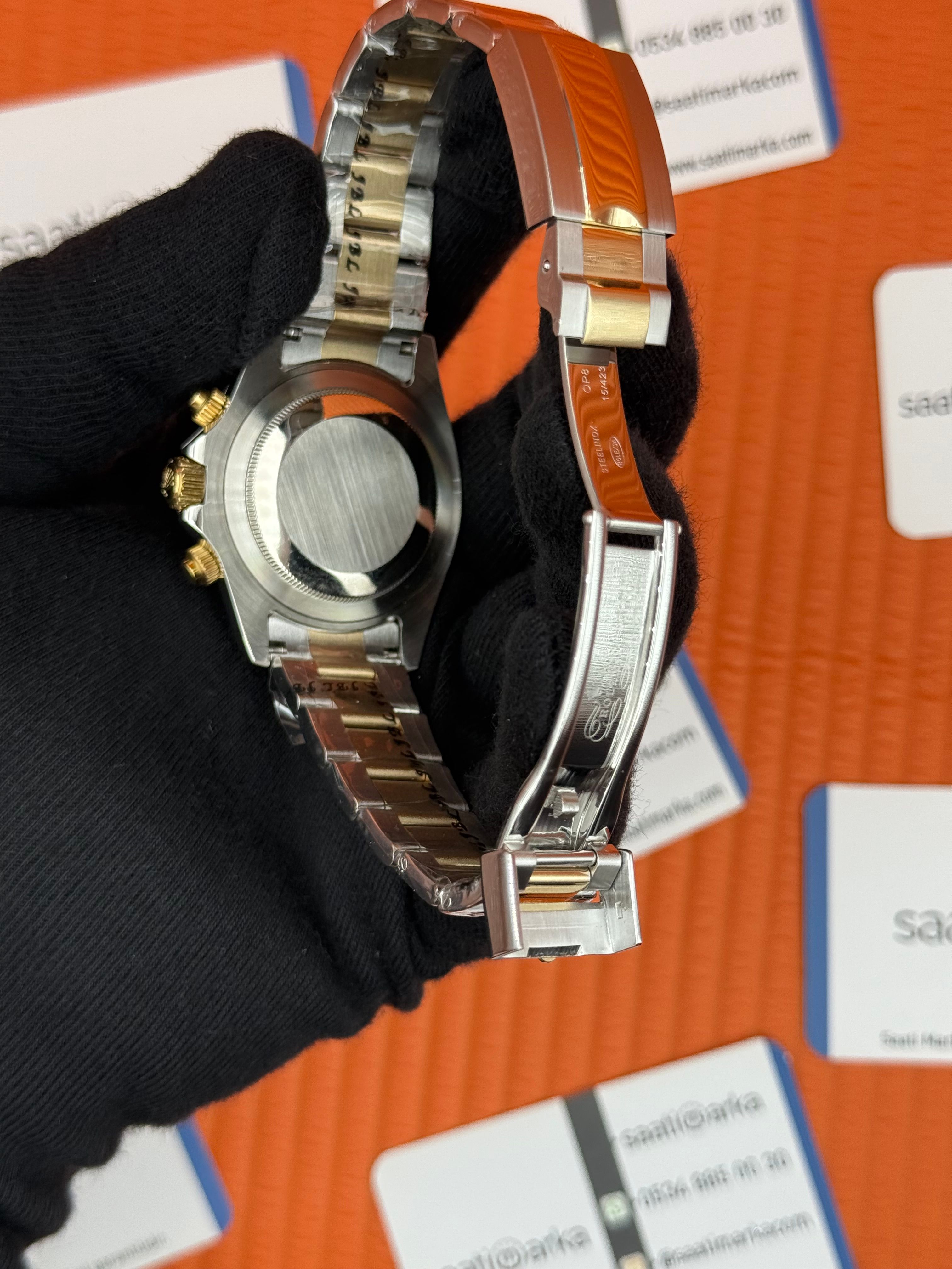 ROLEX Daytona black dial gold silver kasa-kordon