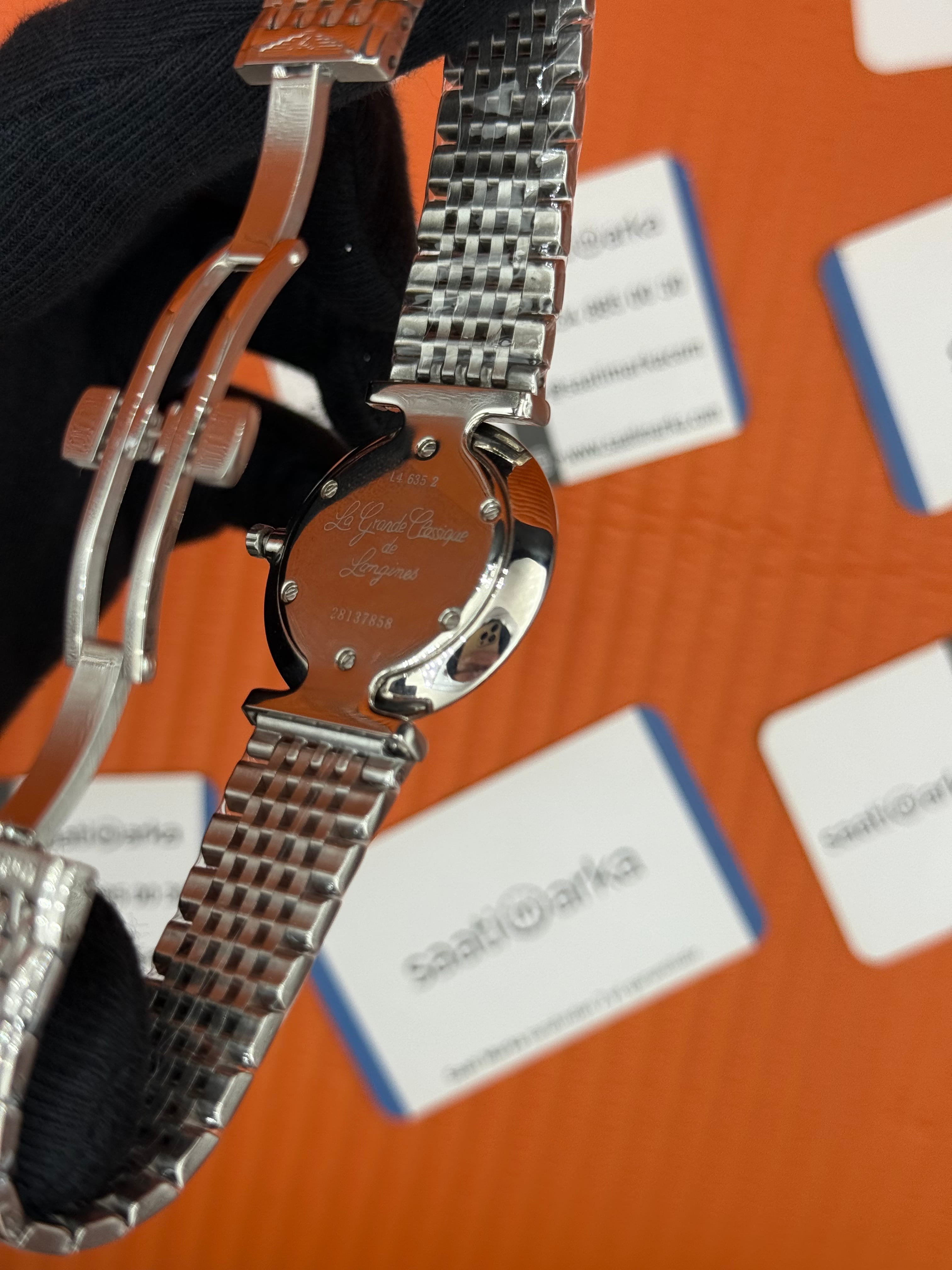 LONGINES taşlı bezel baget taşlı beyaz kadran silver kasa kordon